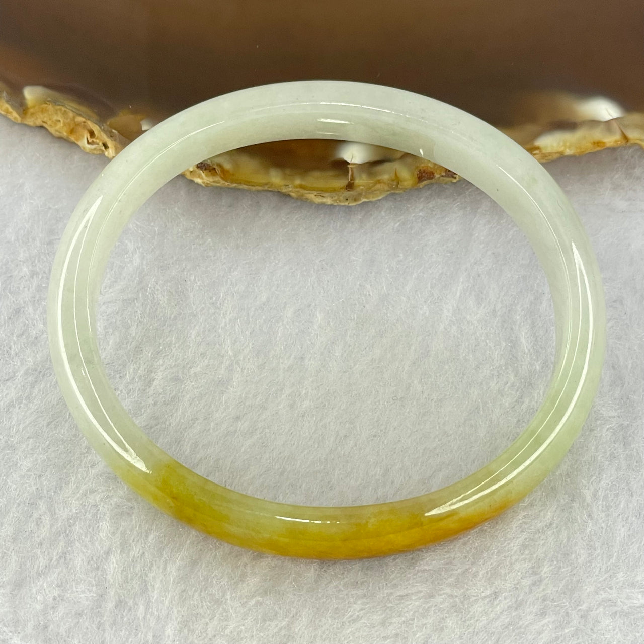 Type A Semi Icy Faint Green Lavender and Yellow Brown Jadeite Oval Bangle Internal Diameter 55.9mm 27.70g 9.9 by 5.9mm - Huangs Jadeite and Jewelry Pte Ltd