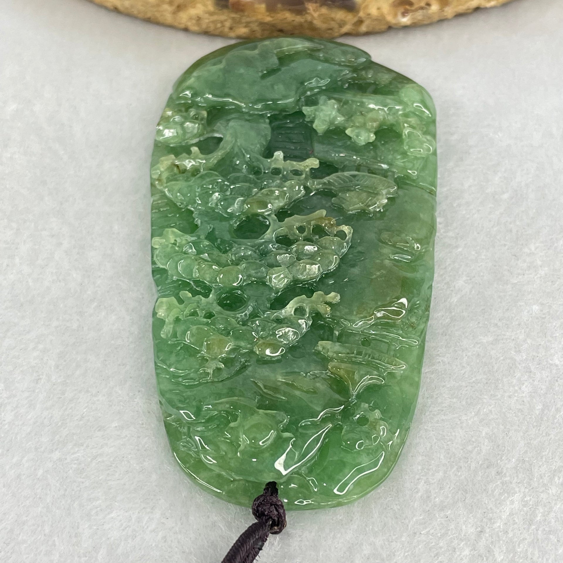 Type A Green Jadeite Double Sided Shan Shui with Double Gui Ren Benefactor Pendant 64.09g 75.6 by 42.6 by 11.2mm - Huangs Jadeite and Jewelry Pte Ltd