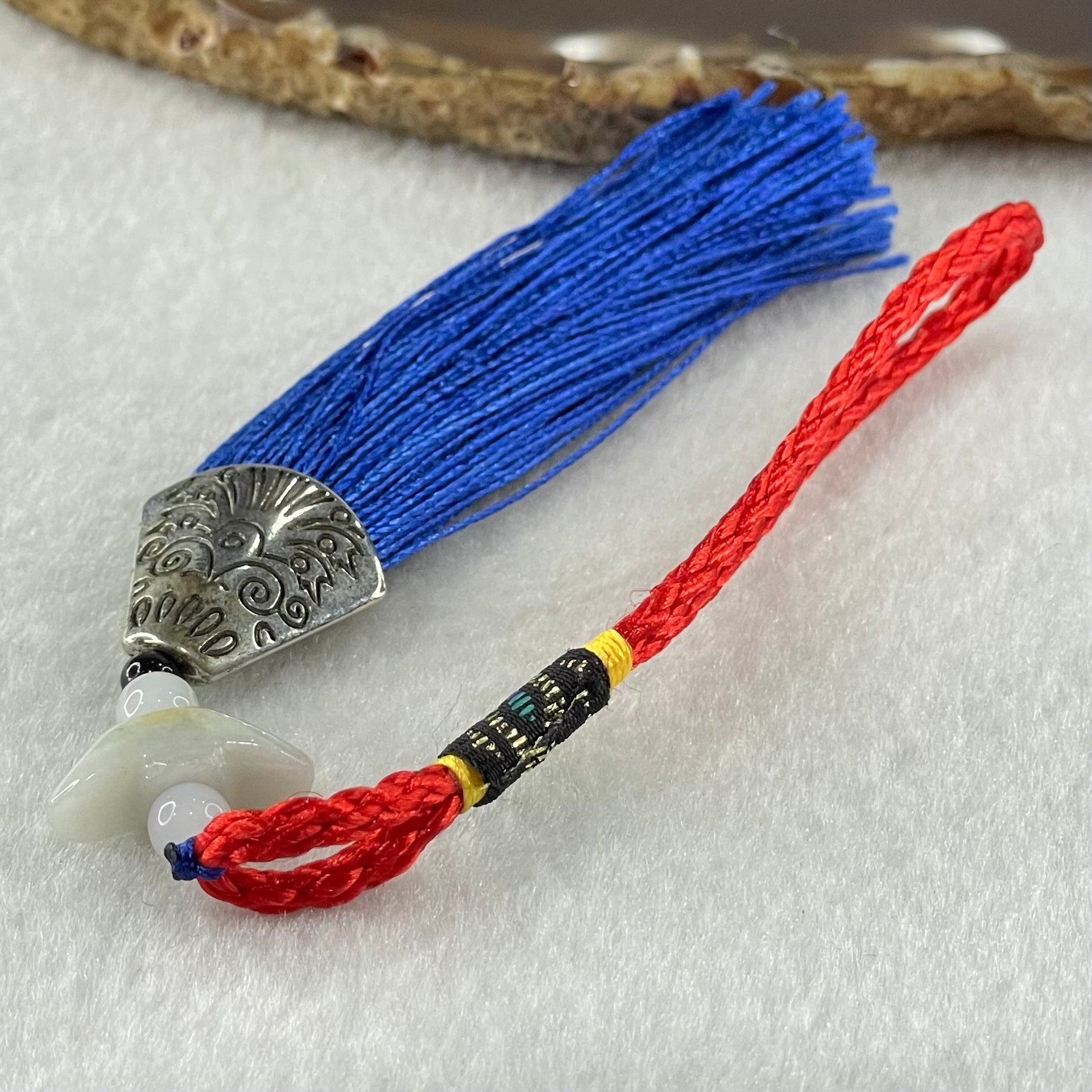 Type A Light Lavender Yellow Jadeite Yuan Bao Ingot in Red Blue String Display 4.75g 7.1 by 17.3 by 6.7mm - Huangs Jadeite and Jewelry Pte Ltd