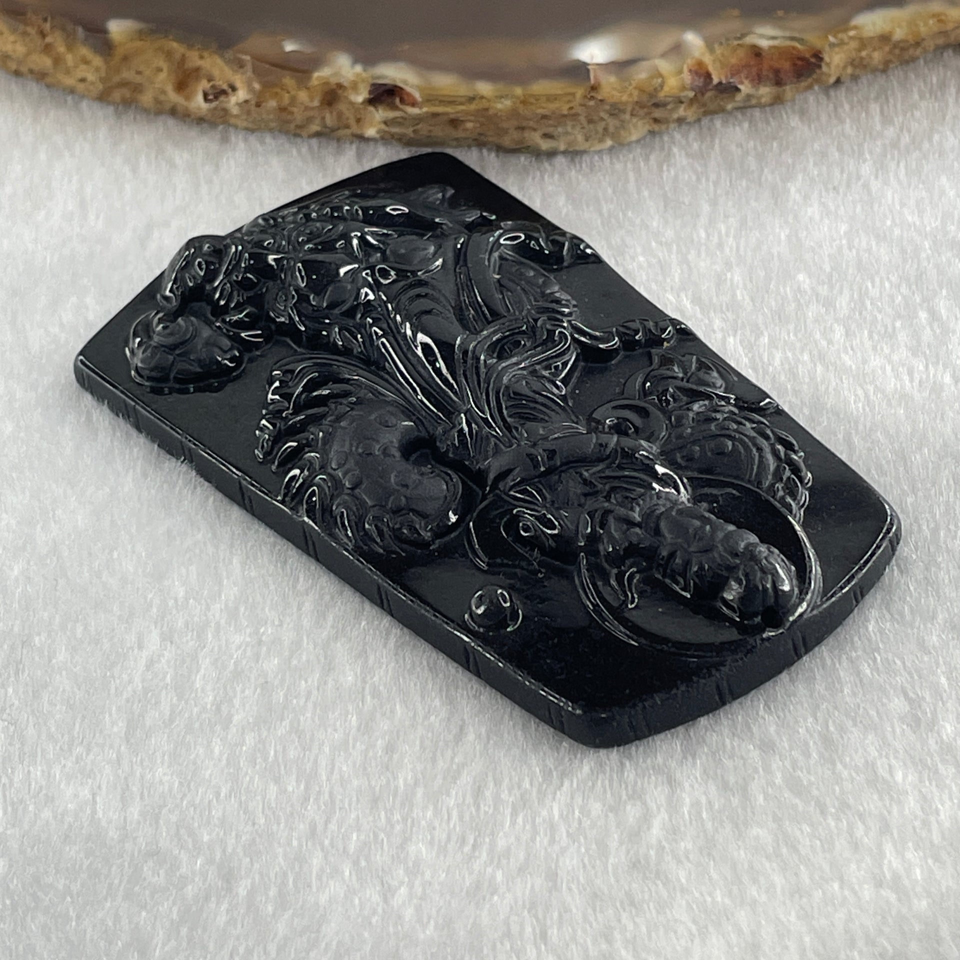Type A Opaque to Partial Translucent Black Omphacite Jadeite Guan Yin on Dragon Pendant 29.57g 65.5 by 41.0 by 8.5mm - Huangs Jadeite and Jewelry Pte Ltd