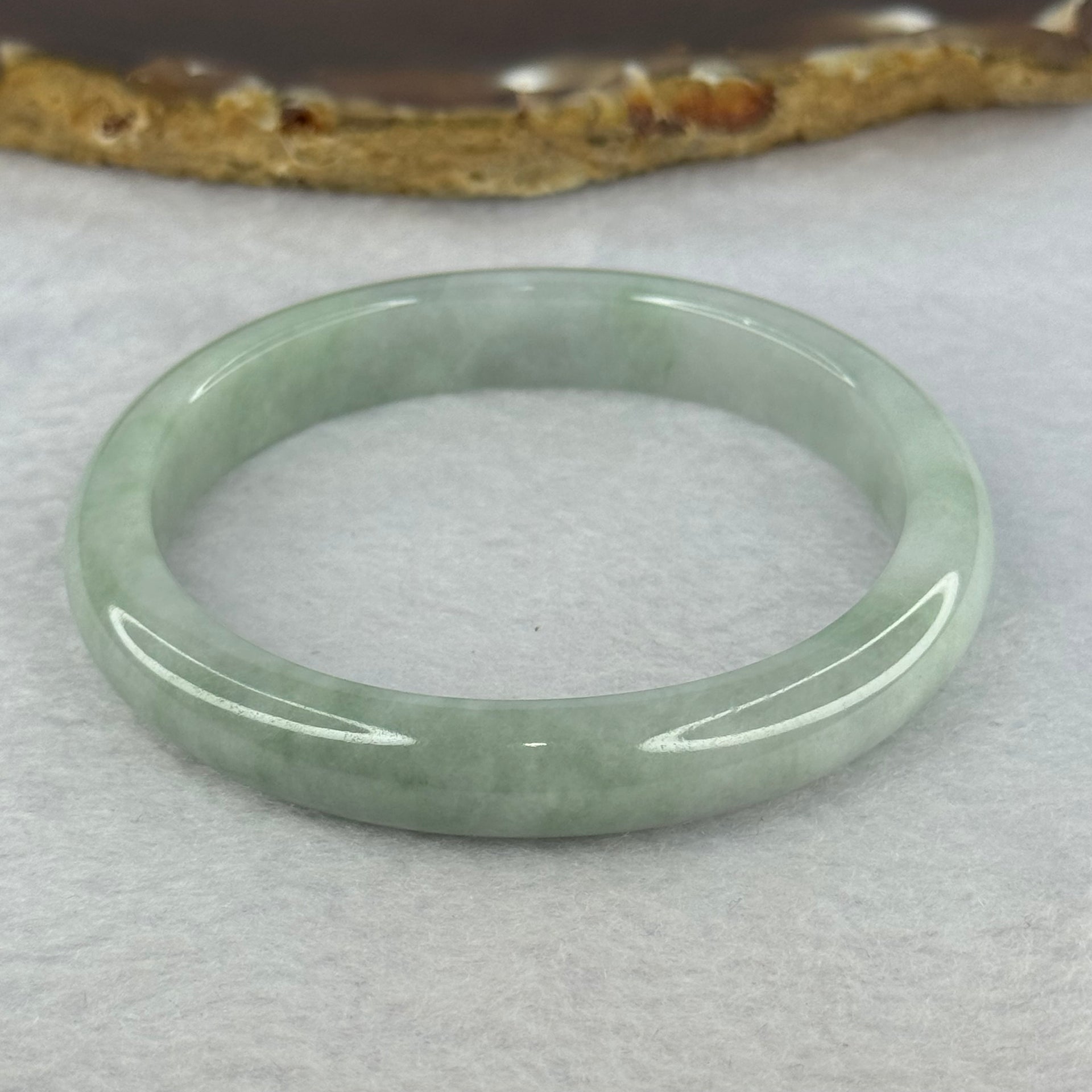 Type A Light Green with Lavender Jadeite Oval Bangle 28.33g Internal Diameter 52.1mm 9.5 by 6.5mm (Very Slight Internal Line) - Huangs Jadeite and Jewelry Pte Ltd