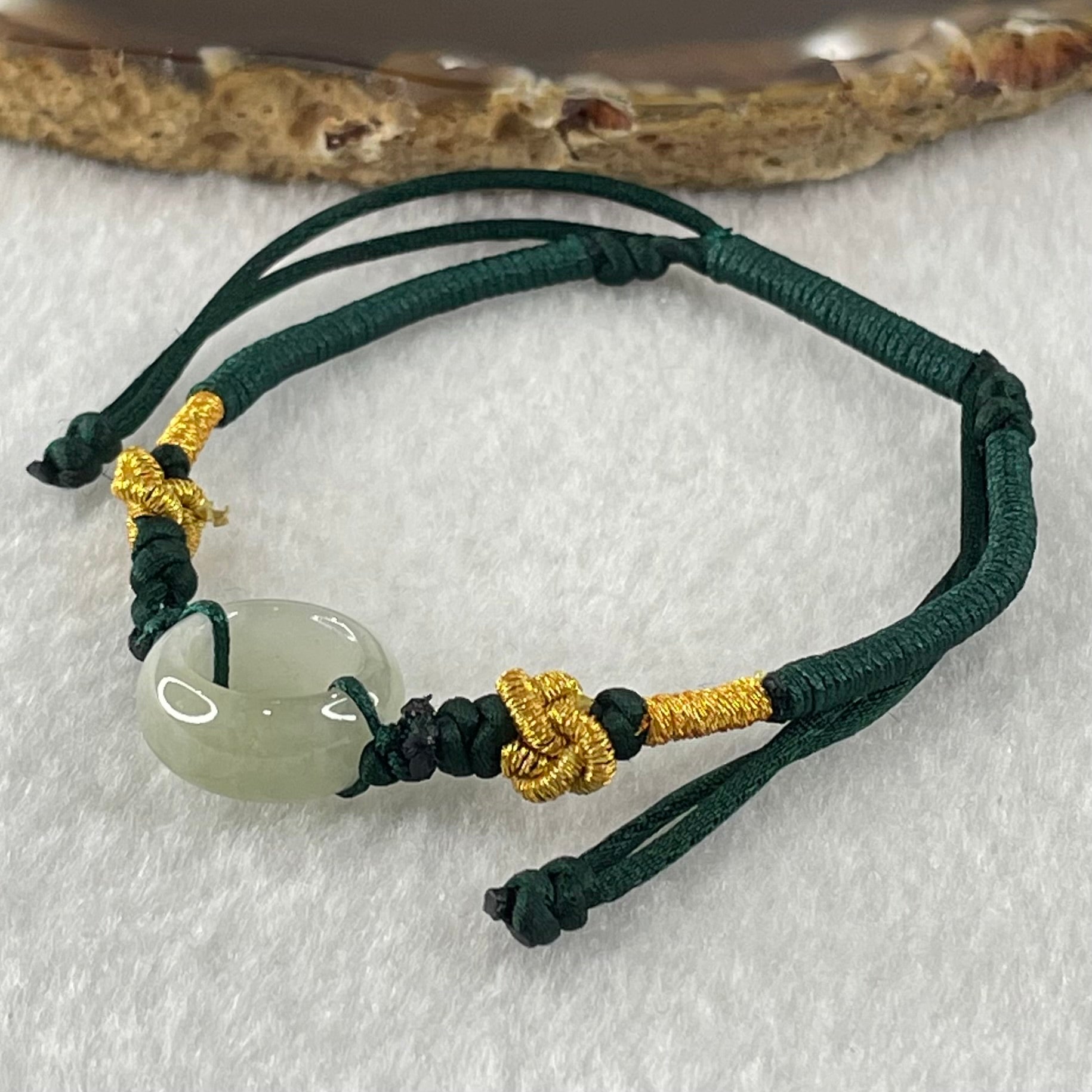 Type A Faint Green Jadeite Ping An Kou String Bracelet 2.98g 15.1 by 6.5mm - Huangs Jadeite and Jewelry Pte Ltd
