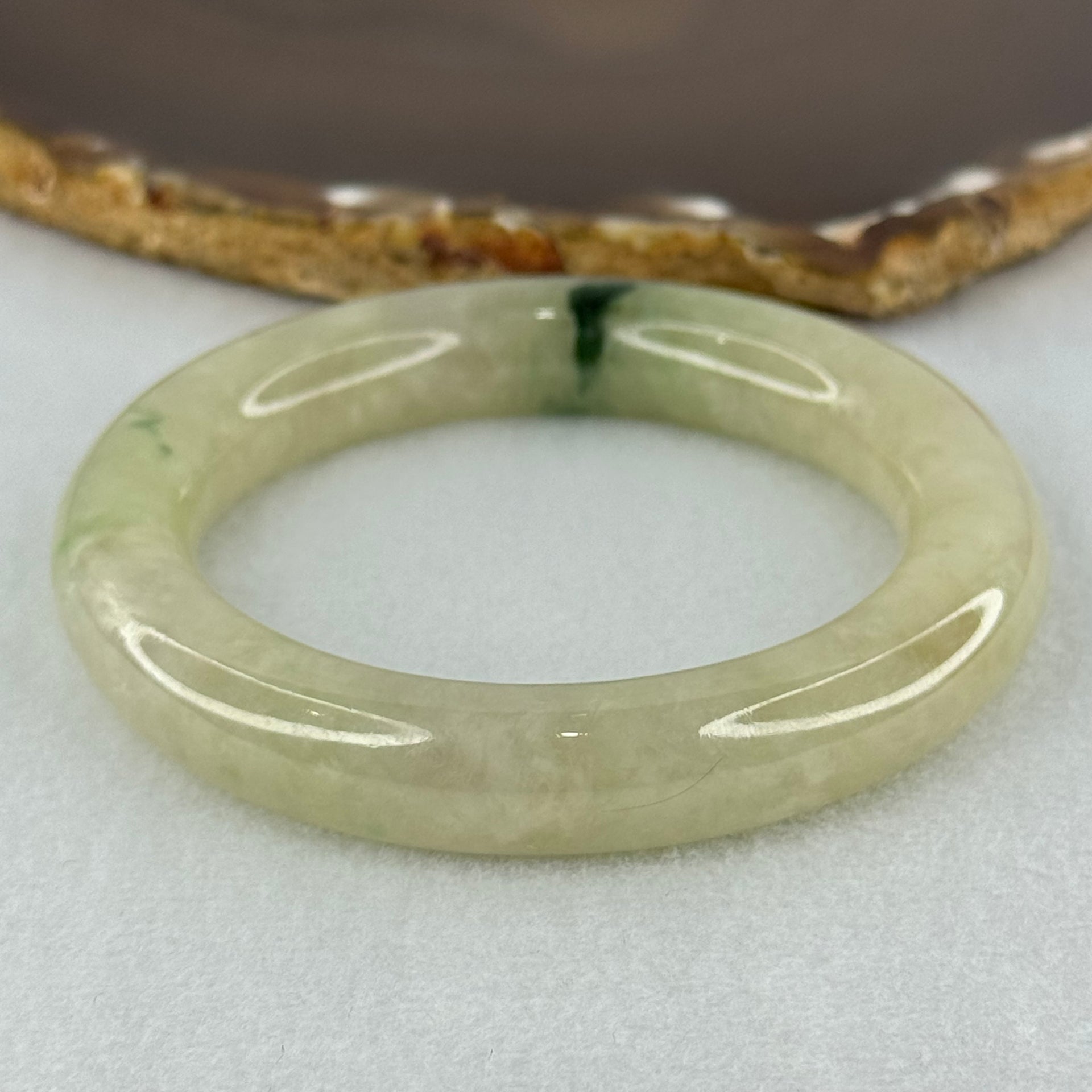 Type A Translucent Semi Icy Light Yellowish Green with Moss Green Patch Jadeite Bangle Internal Diameter 55.3mm 76.40g 12.3 by 11.6mm (Very Slight External Rough) - Huangs Jadeite and Jewelry Pte Ltd