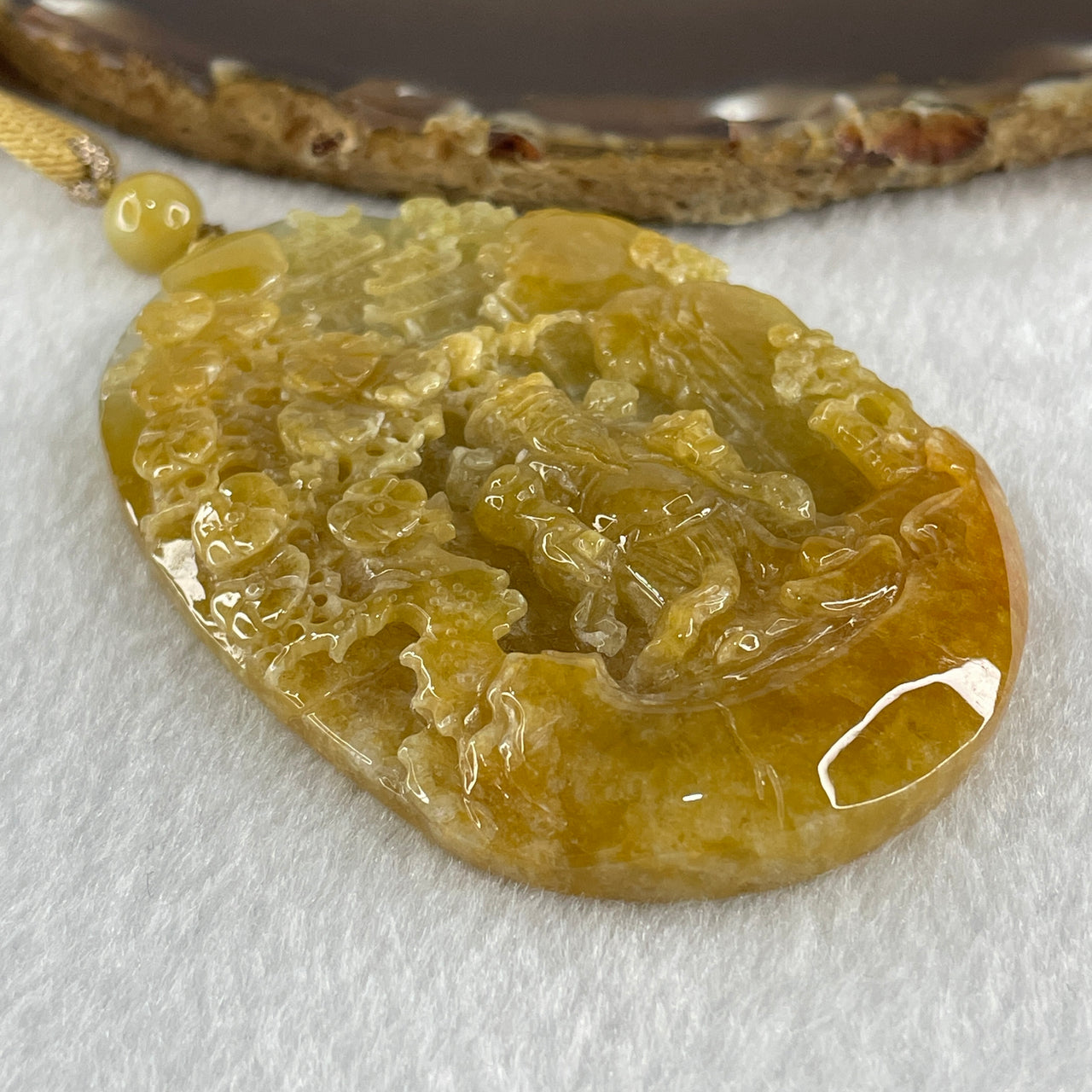 Grand Master Type A Yellowish with Light Green Patches Jadeite Cai Shen Ye God Of Fortune on Shan Shui with Gui Ren Pendant 75.70g 77.0 by 51.1 by 10.0mm