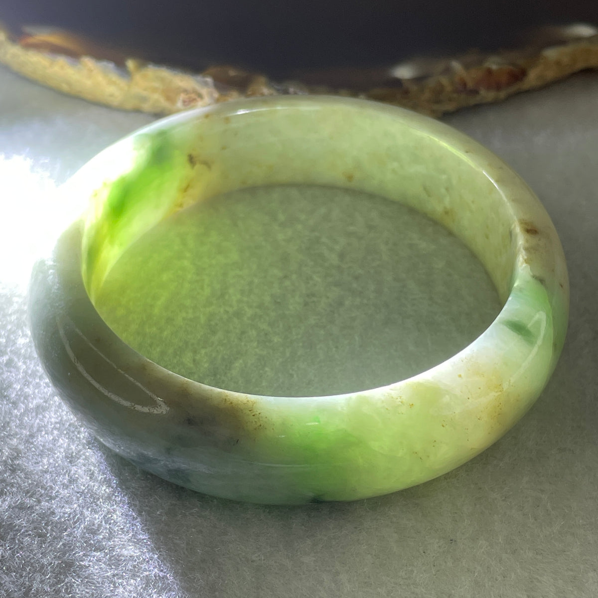 Natural Type Green with Reddish Brown Piao Hua Jadeite Bangle 62.49g Inner Diameter 55.5mm 15.4 by 8.0mm (Slight Internal Line) - Huangs Jadeite and Jewelry Pte Ltd