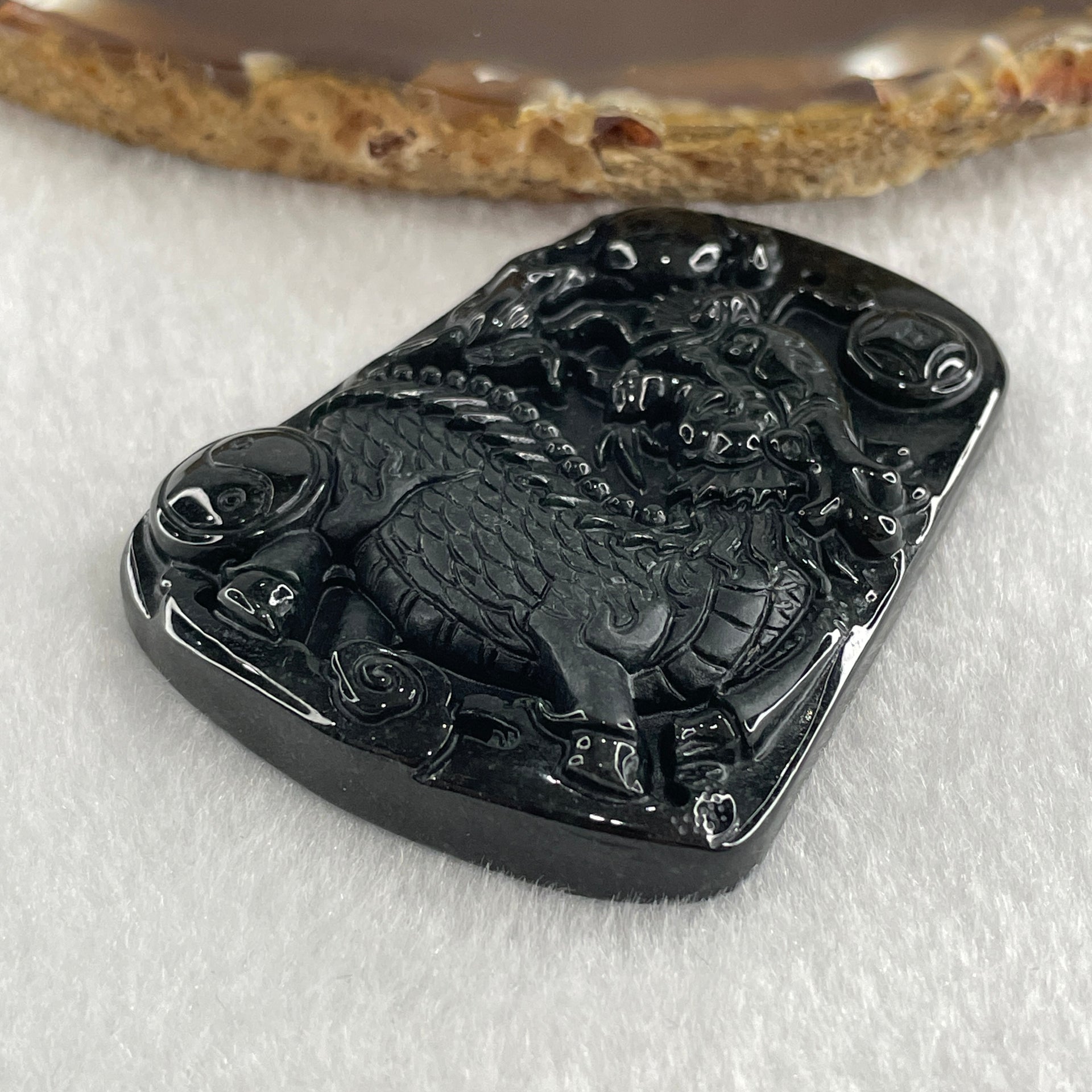 Type A Opaque to Partial Translucent Black Omphacite Jadeite Kirin Qilin Pendant 30.64g 55.7 by 43.5 by 8.5mm - Huangs Jadeite and Jewelry Pte Ltd
