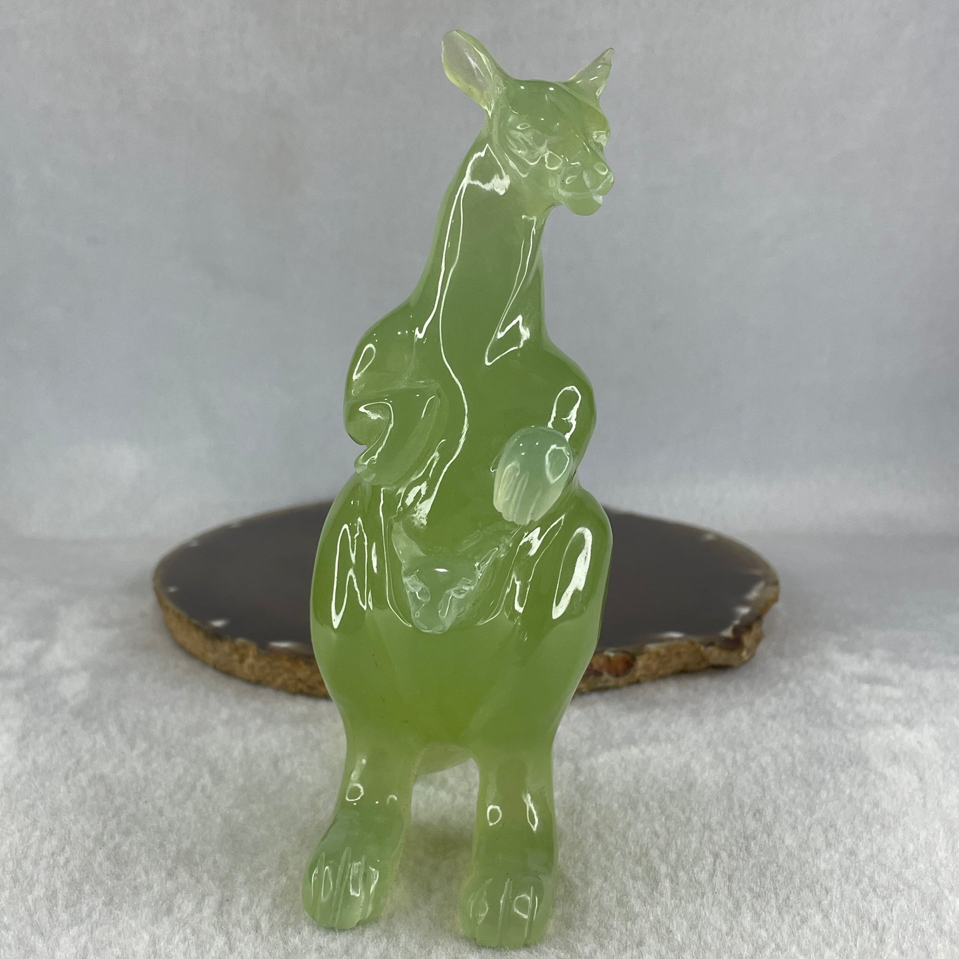Natural Green Serpentine Kangaroo with Baby with Wooden Stand Display 382.2g 119.5 by 63.0 by 159.0mm - Huangs Jadeite and Jewelry Pte Ltd
