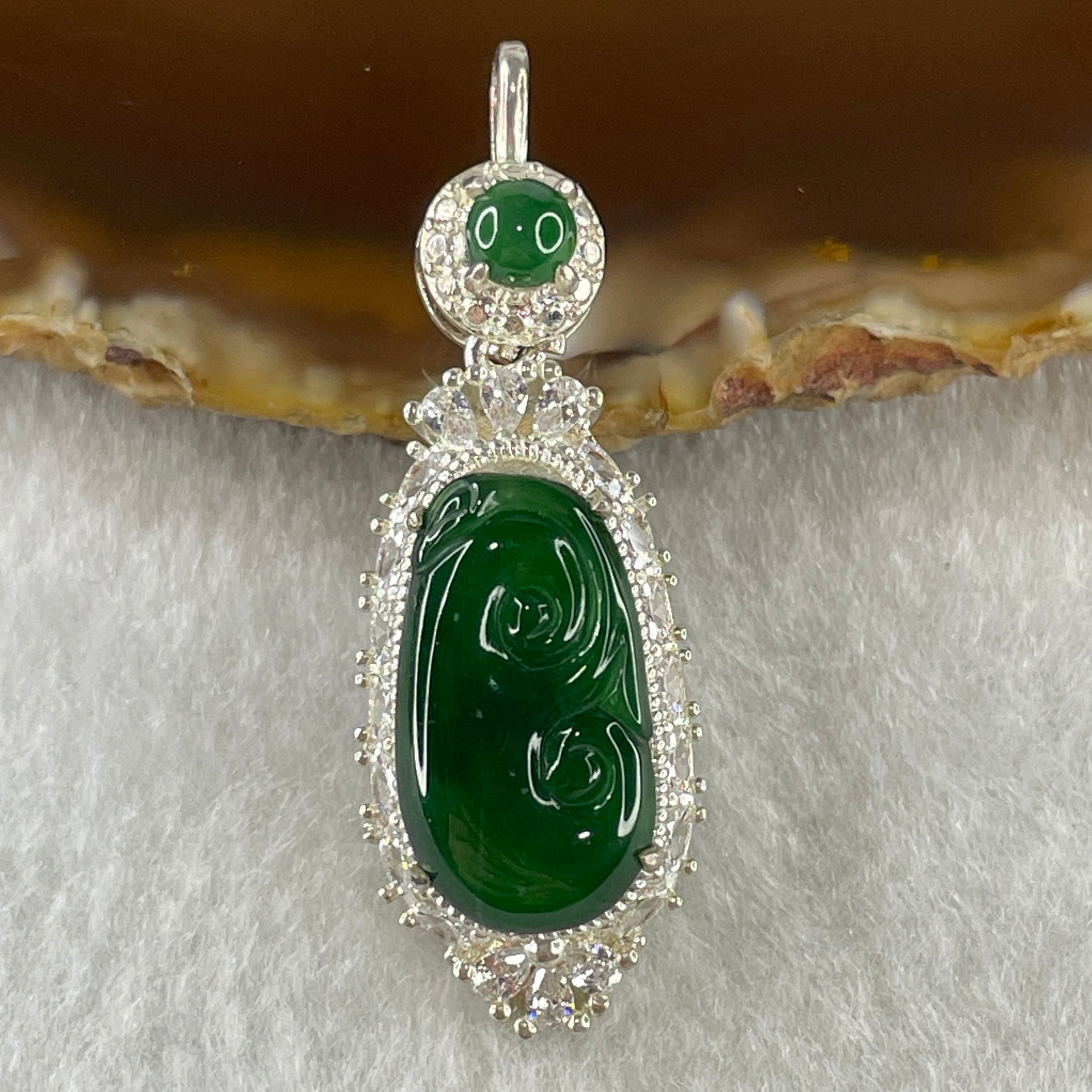 Type A Natural Semi Icy Bright Green Jadeite Ruyi Stone for Setting 19.0 by 10.8 by 2.5mm (On Silver Pendant Mold) 6.75g - Huangs Jadeite and Jewelry Pte Ltd