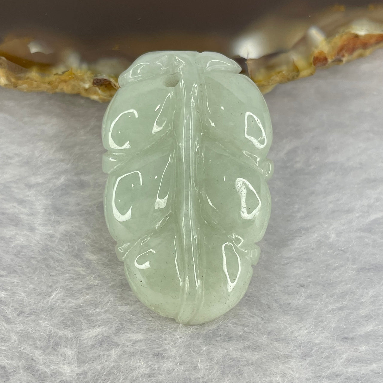A Light Green Jadeite Leaf for Overnight Success 一夜发财 7.86g 32.6 by 20.8 by 6.1mm - Huangs Jadeite and Jewelry Pte Ltd