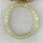 Type A Semi Icy Light Yellowish Blueish Green Jadeite Beads Bracelet 13.73g 14.5cm 6.8mm 27 Beads - Huangs Jadeite and Jewelry Pte Ltd