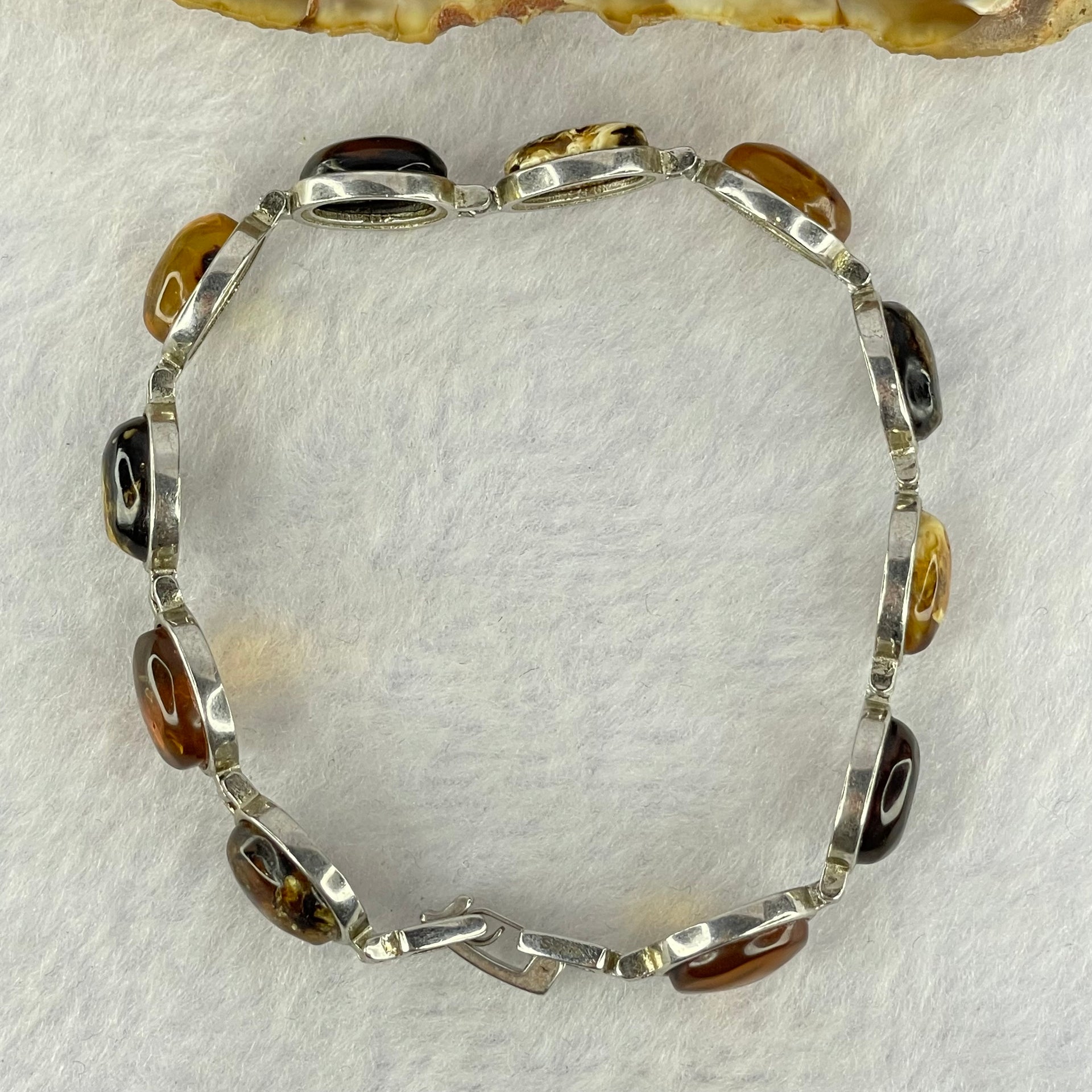 Natural Mixed Color Amber Beads in Sliver Bracelet 天然抚顺多宝手链 11.11g 16.5cm 10.0 by 7.9 by 4.0mm 11pcs - Huangs Jadeite and Jewelry Pte Ltd