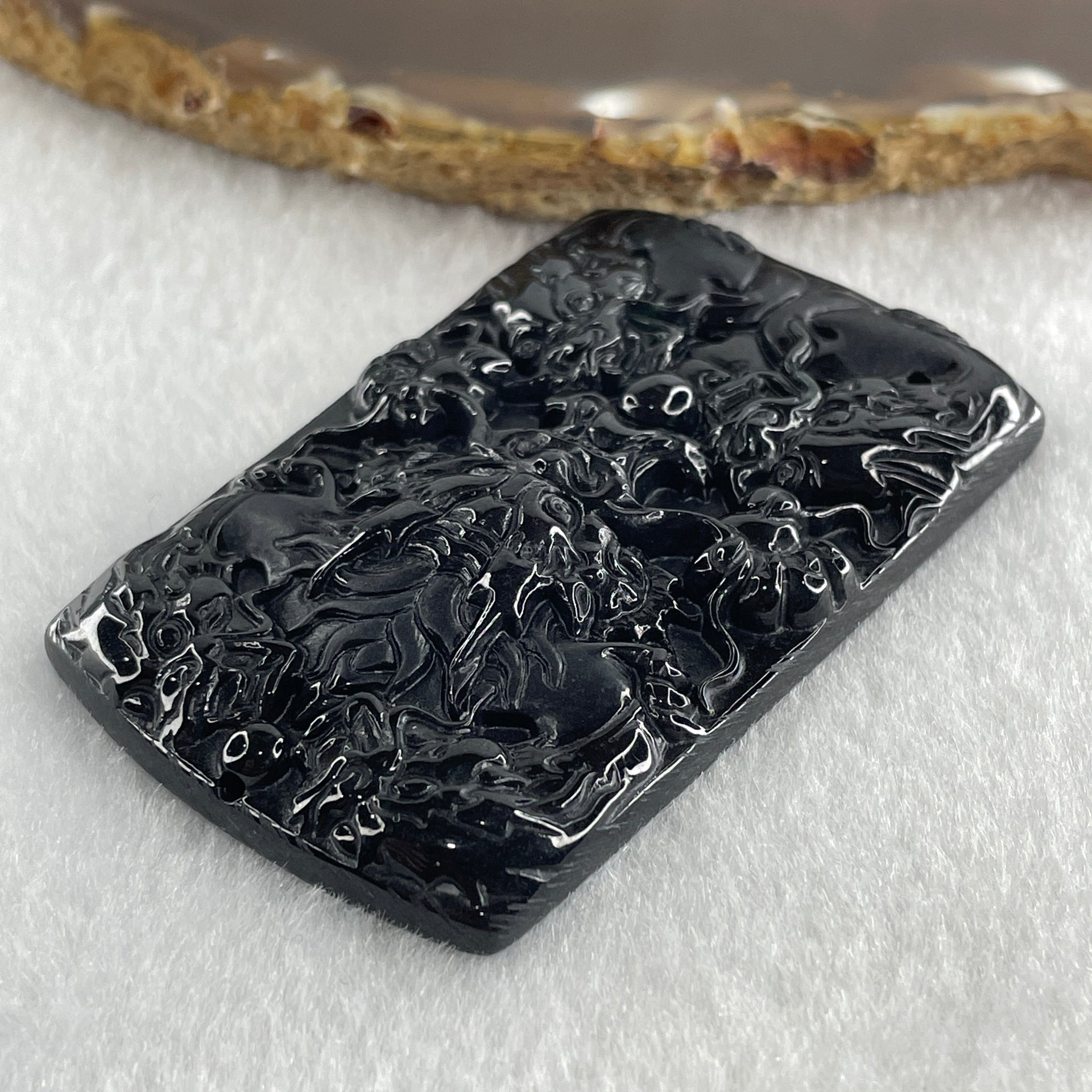 Type A Opaque to Partial Translucent Black Omphacite Jadeite 5 Dragons Pendant 32.20g 64.7 by 40.0 by 8.0mm - Huangs Jadeite and Jewelry Pte Ltd
