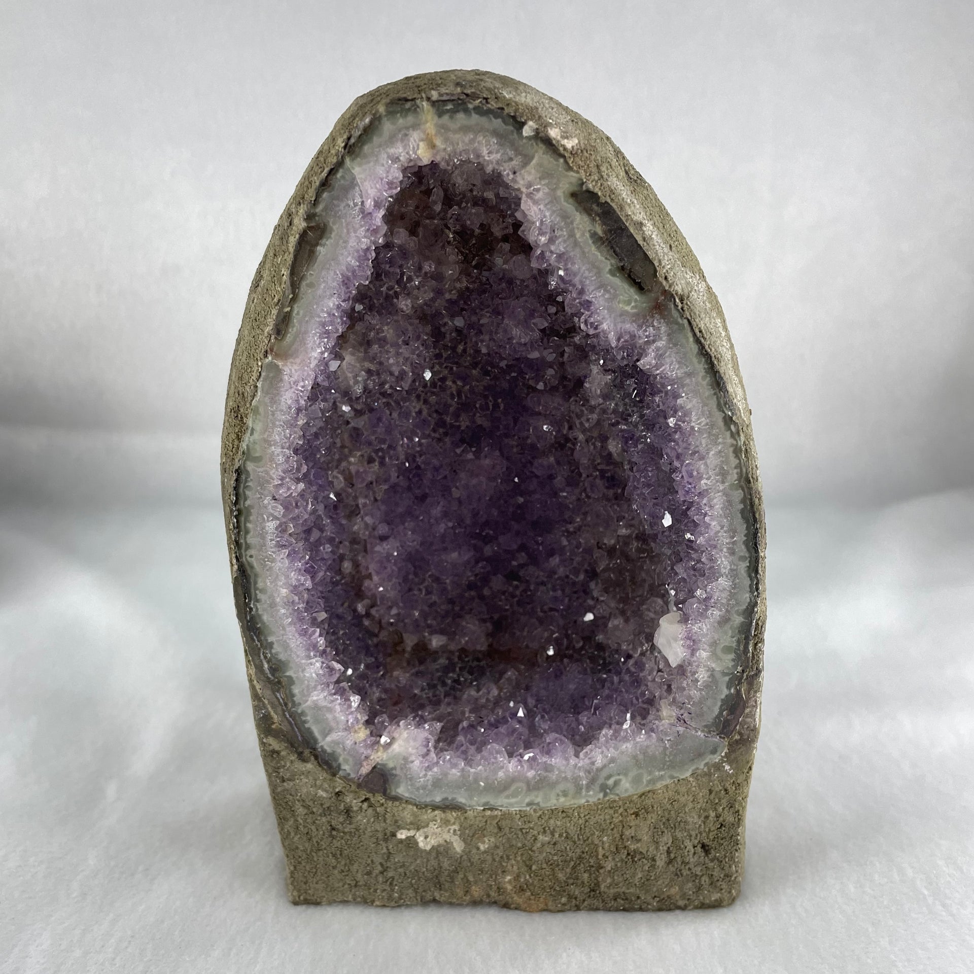 Natural Amethyst Cave with Wooden Stand 1,451.2g 116.4 by 93.7 by 190.0mm - Huangs Jadeite and Jewelry Pte Ltd