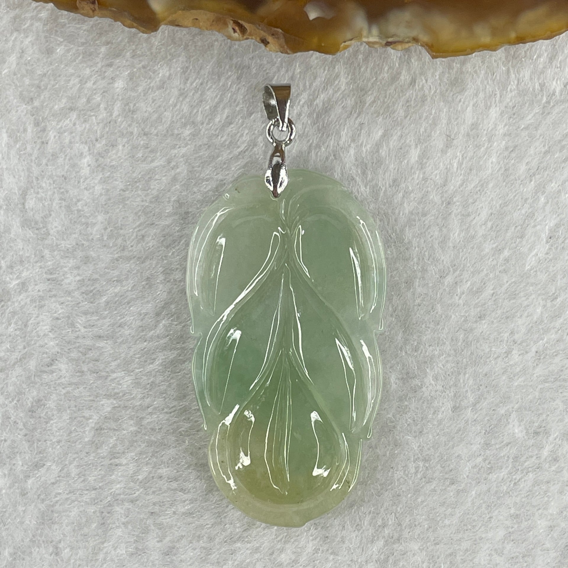 Natural Type A Semi Icy Light Green with Light Yellow Jadeite Prosperity Leaf Pendant in Silver Clasp Signifying Overnight Success 6.55g 38.4 by 21.6 by 4.0mm - Huangs Jadeite and Jewelry Pte Ltd