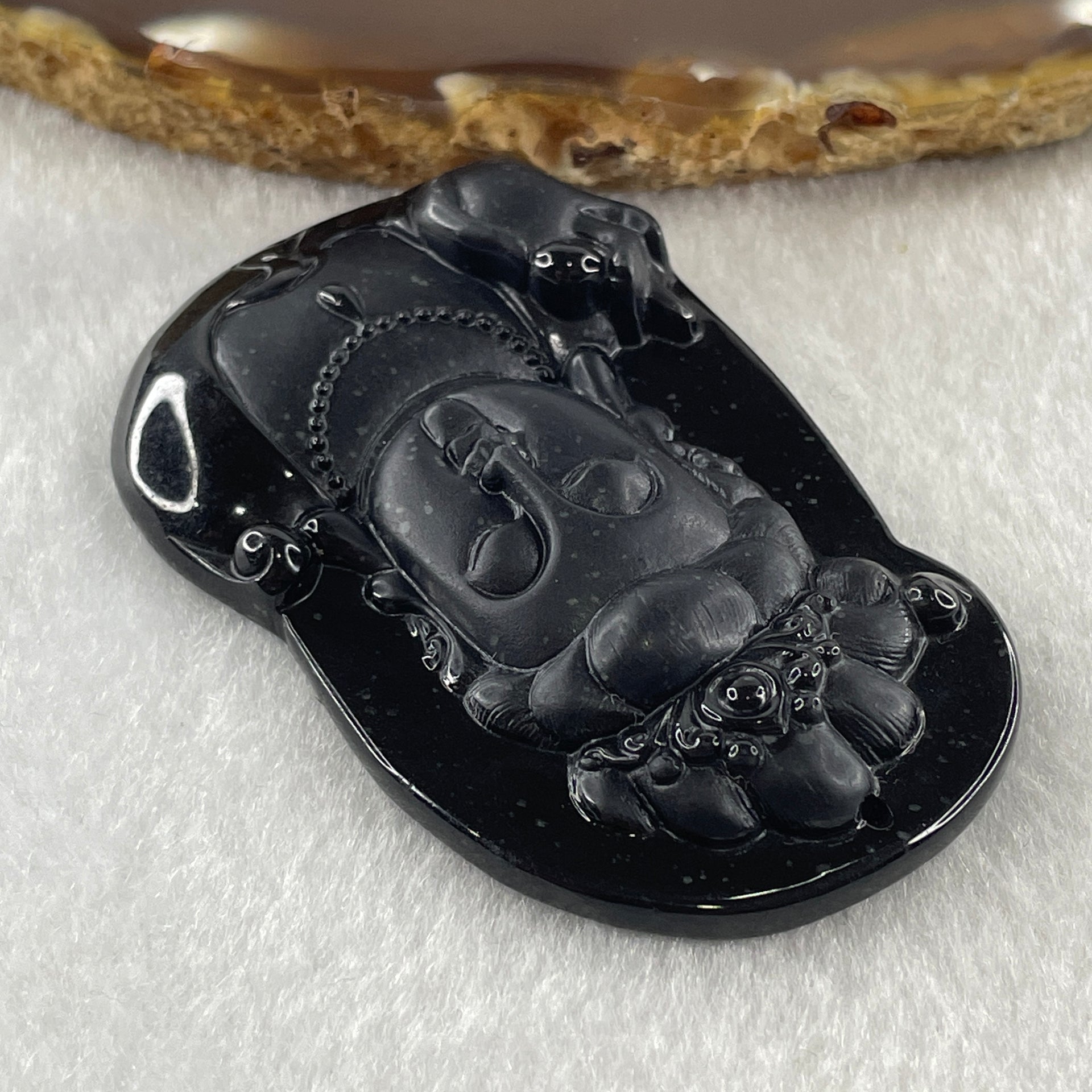 Type A Opaque Black Omphacite Jadeite Guan Yin Pendant 25.49g 60.0 by 38.3 by 9.5mm - Huangs Jadeite and Jewelry Pte Ltd