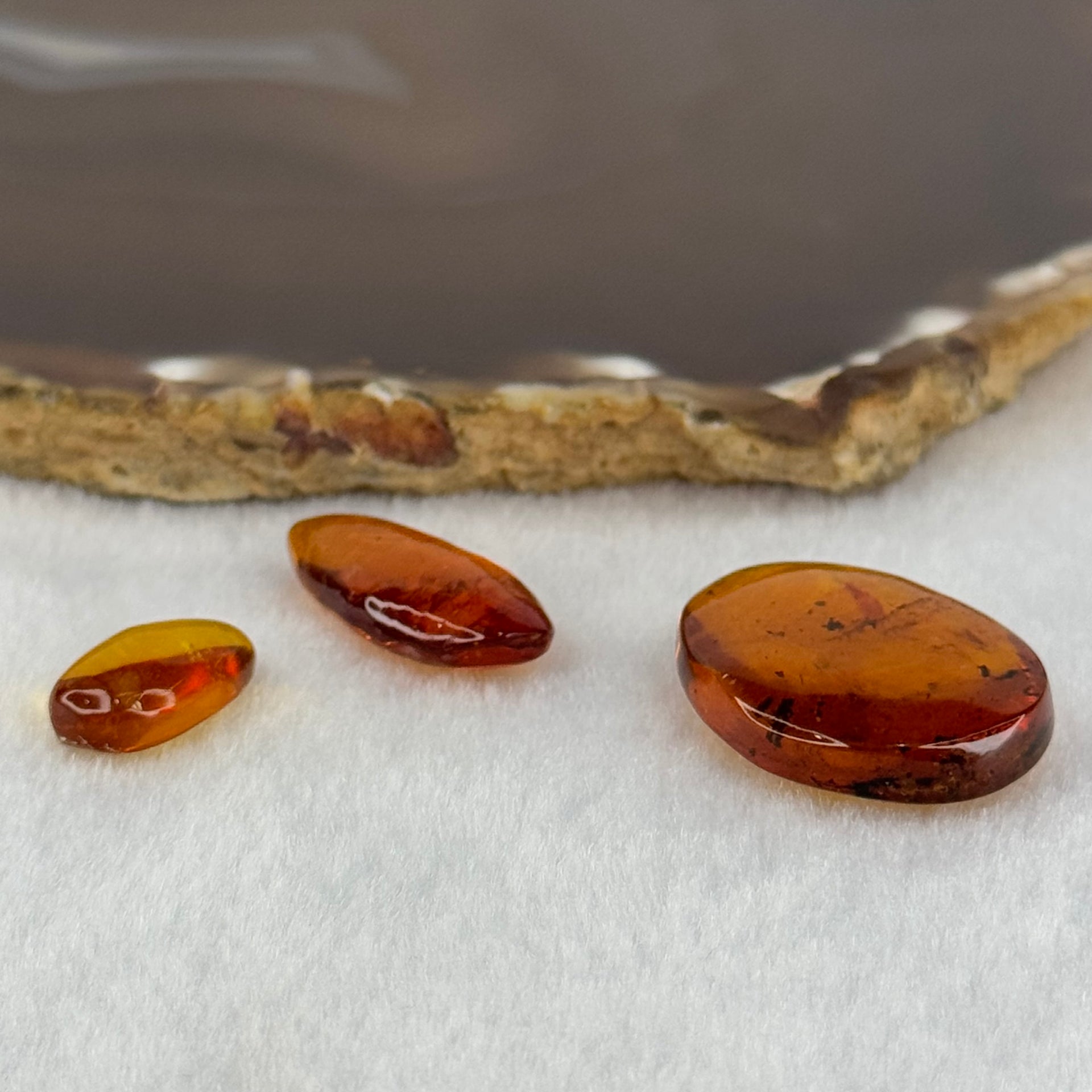 Natural Amber for Setting (Set of 3) 3.44g 30.8 by 21.3 by 8.6mm 1.08g 25.4 by 11.4 by 6.7mm 0.56g 17.2 by 9.2 by 5.9mm - Huangs Jadeite and Jewelry Pte Ltd