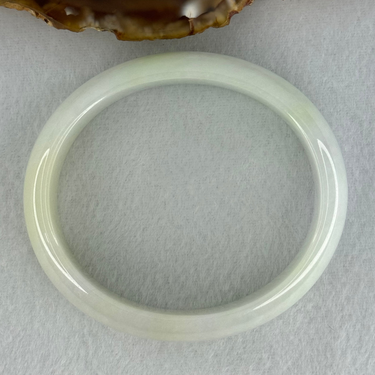 Type A Faint Lavender Green Jadeite Oval Bangle Internal Diameter 57.1mm 57.86g 17.3 by 6.9mm (Close to Perfect) - Huangs Jadeite and Jewelry Pte Ltd
