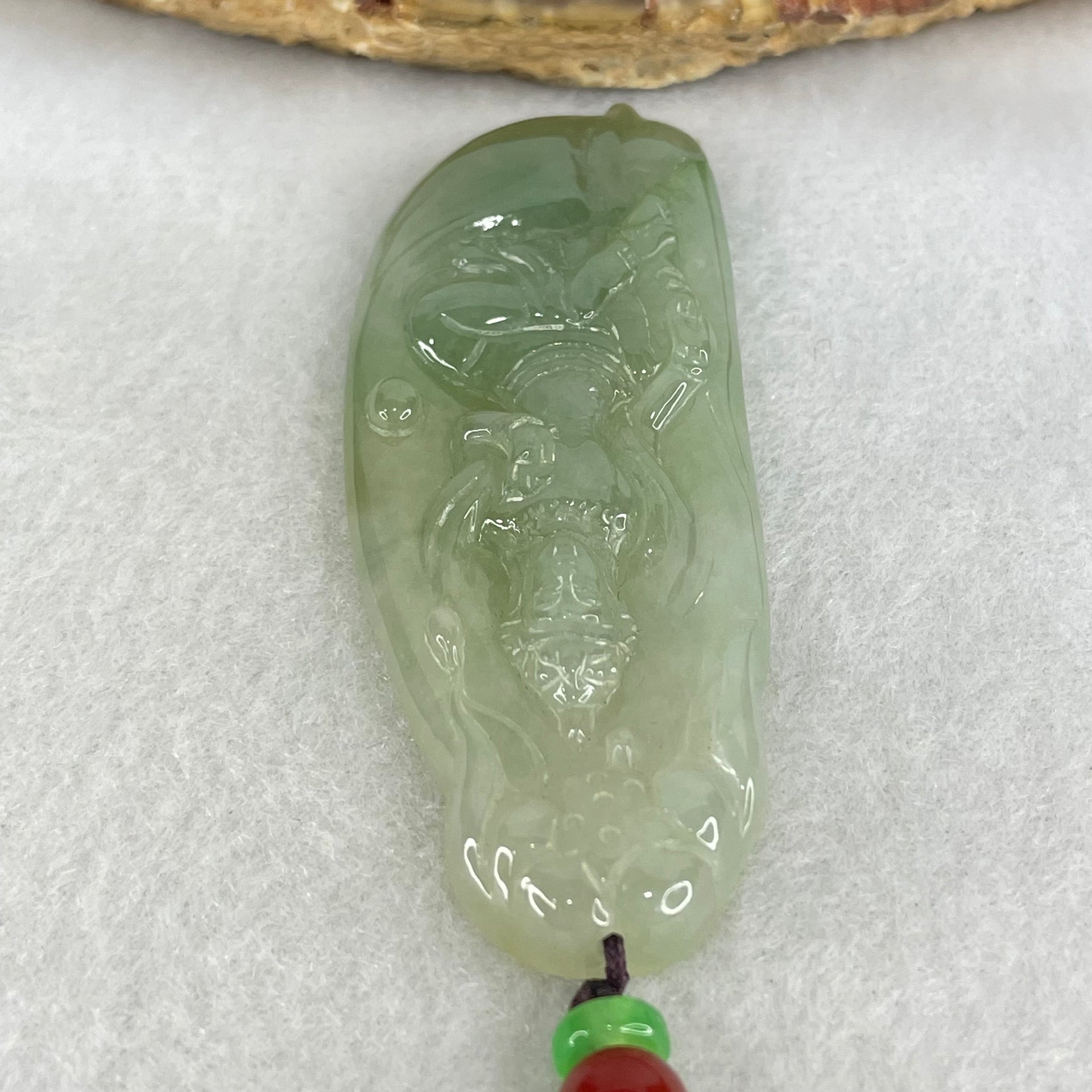 Type A Semi Icy Light Blueish Green Jadeite Guan Yin Pendant 20.29g 62.4 by 25.2 by 6.3mm - Huangs Jadeite and Jewelry Pte Ltd