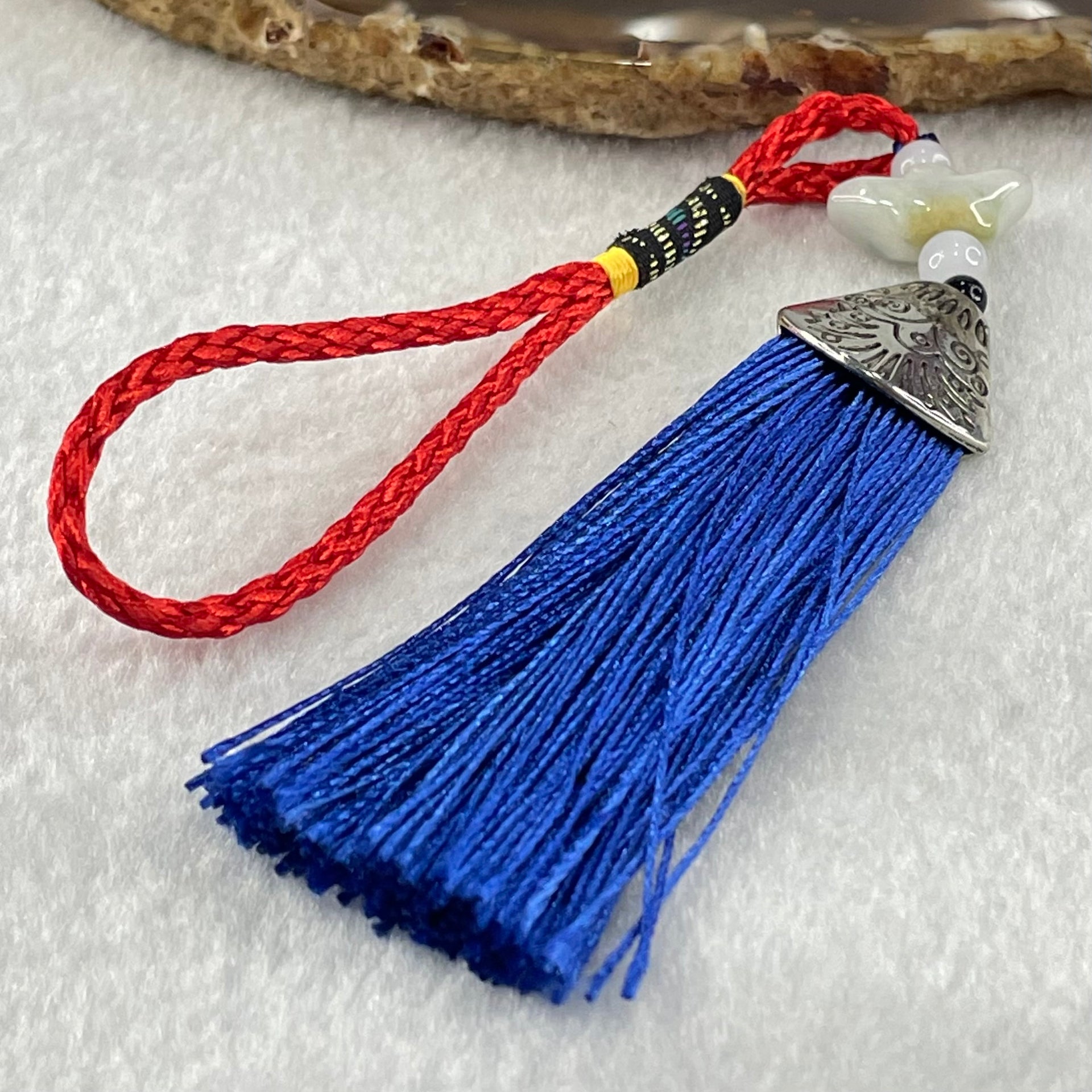 Type A Light Lavender Yellow Jadeite Yuan Bao Ingot in Red Blue String Display 4.75g 7.1 by 17.3 by 6.7mm - Huangs Jadeite and Jewelry Pte Ltd