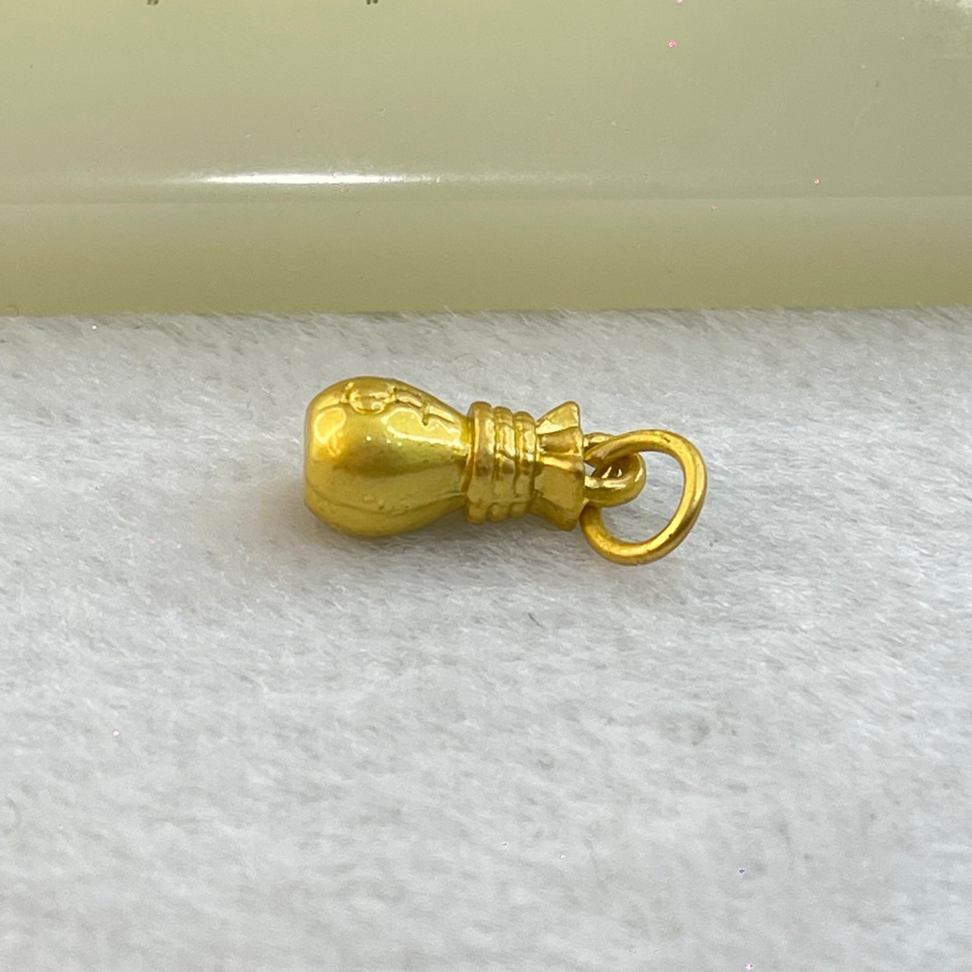 Tiny Money Bag Charm 2.15g 15.0 by 7.0mm - Huangs Jadeite and Jewelry Pte Ltd