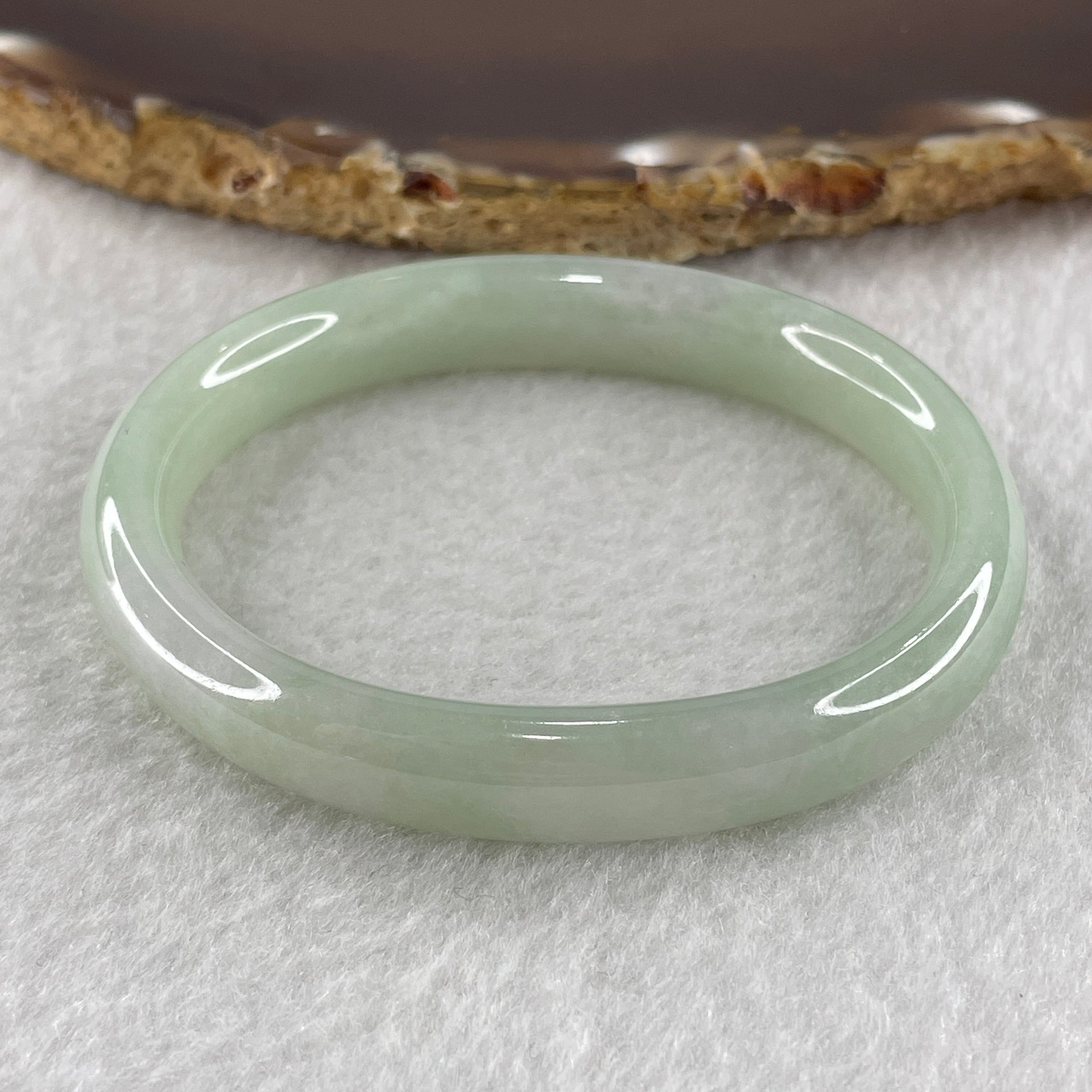 Type A Jelly Full Light Green Jadeite Oval Bangle Internal Diameter 53.7mm 31.30g 9.7 by 7.0mm (Very Very Slight Internal Lines) - Huangs Jadeite and Jewelry Pte Ltd