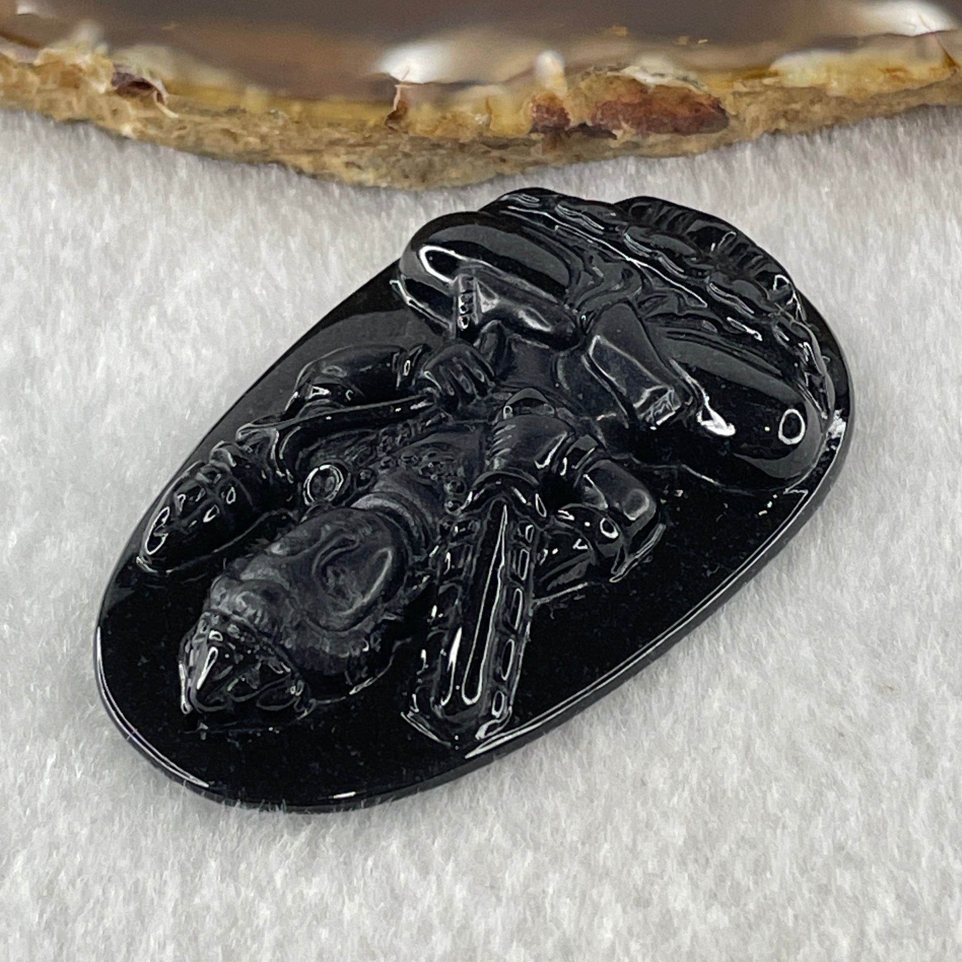 Type A Opaque to Partial Translucent Black Omphacite Jadeite Akasagarbha Bodhissattva Pendant Ox and Tiger Zodiac Guardian 17.04g 52.7 by 34.2 by 7.4mm - Huangs Jadeite and Jewelry Pte Ltd