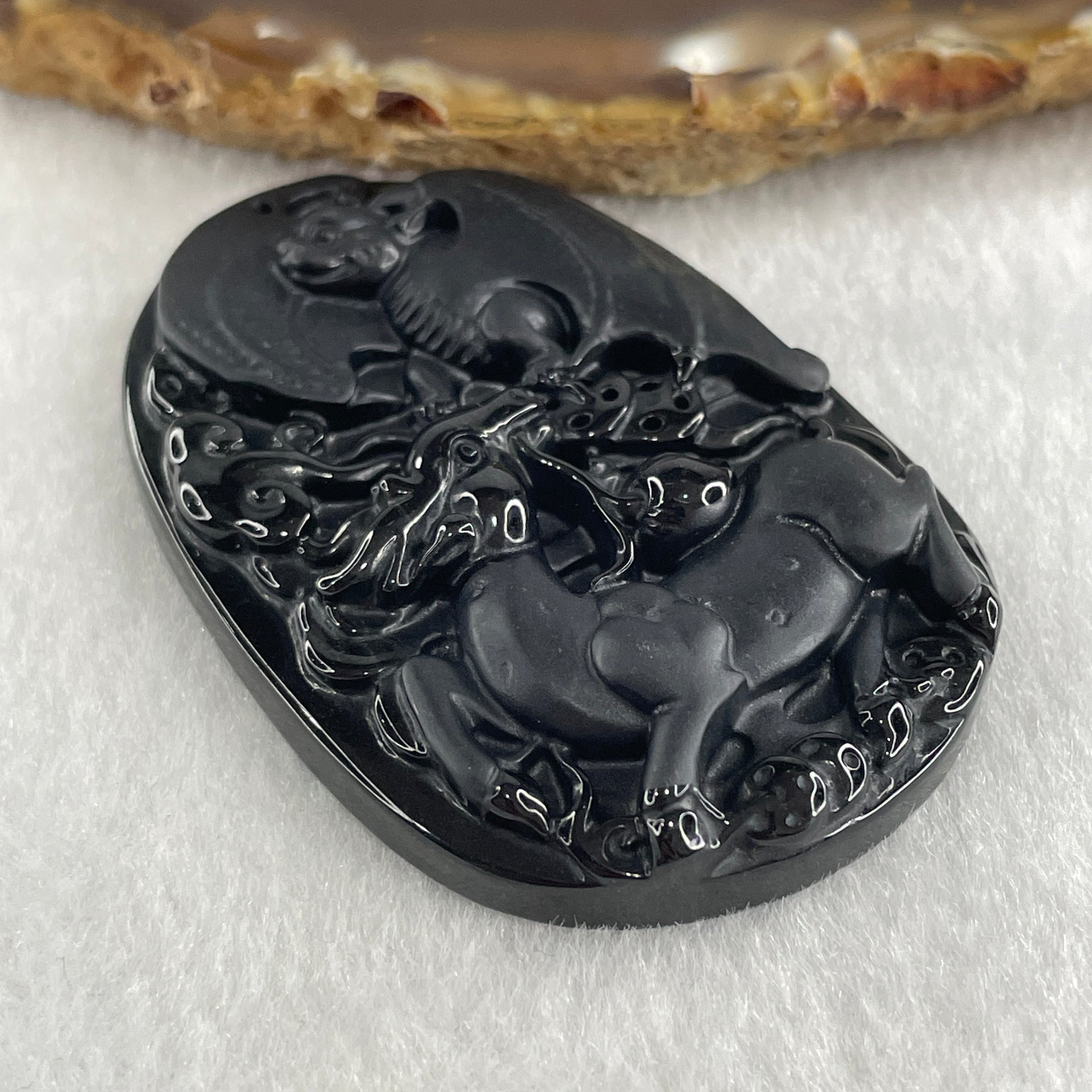 Type A Opaque to Partial Translucent Black Omphacite Jadeite Deer, Bat, Peach, Coins and Ruyi Pendant 27.95g 56.4 by 38.2 by 9.4mm - Huangs Jadeite and Jewelry Pte Ltd