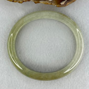 Type A Yellowish Green Lavender Jadeite Oval Bangle Internal Diameter 58.5mm 67.31g 10.7 by 8.1mm (Very Slight Fine Internal Line) - Huangs Jadeite and Jewelry Pte Ltd