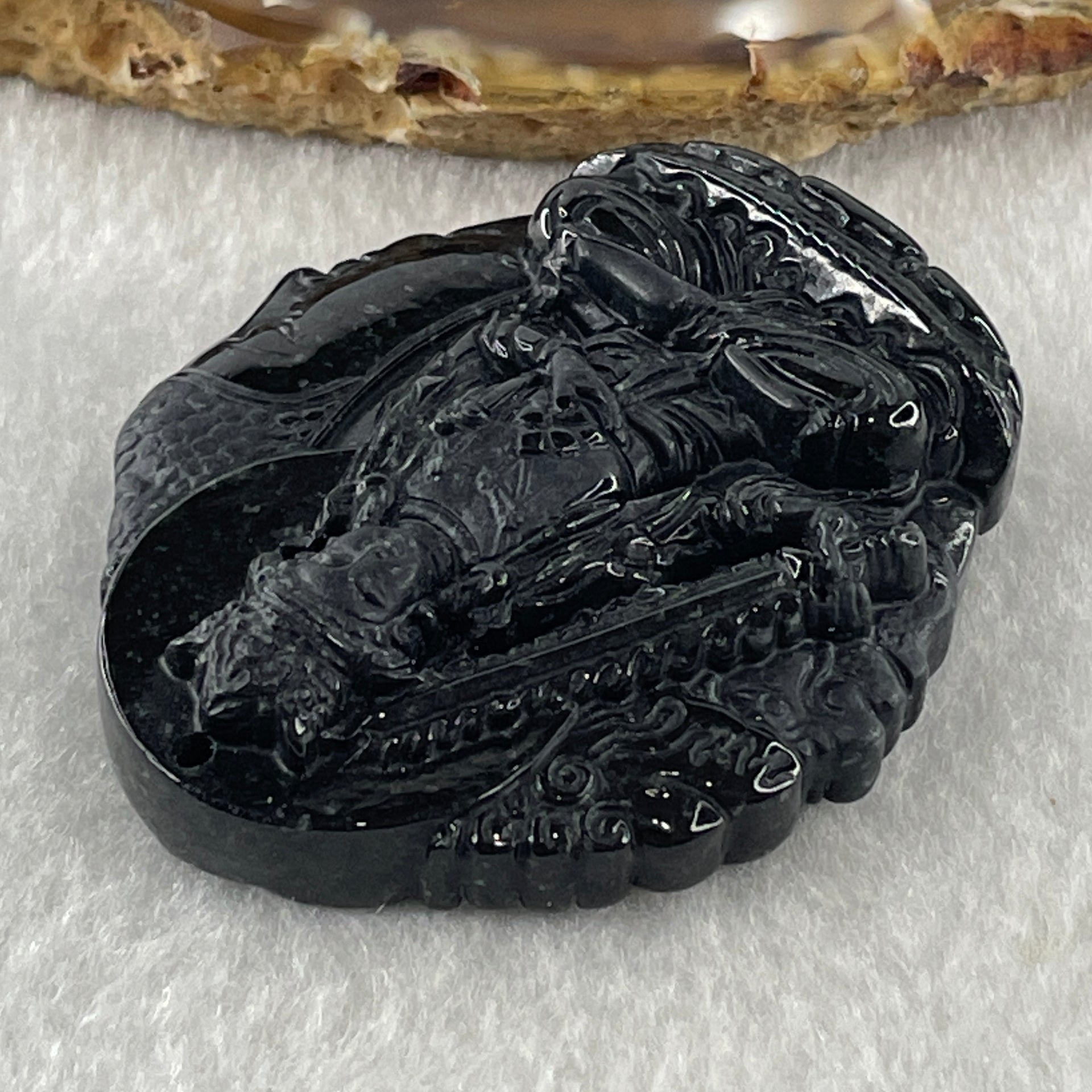 Type A Opaque Black Omphacite Jadeite Good Vs Evil Akasagarbha Bodhissattva Pendant Ox and Tiger Zodiac Guardian 45.77g 50.8 by 43.8 by 13.1mm - Huangs Jadeite and Jewelry Pte Ltd