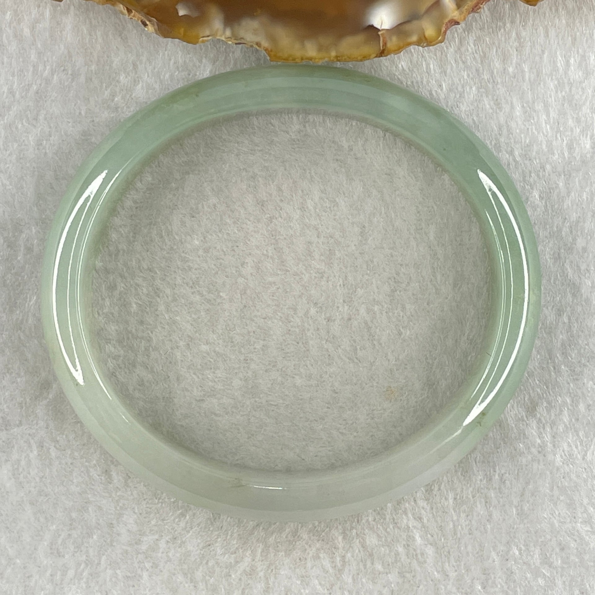 Natural Type A Jelly Light to Faint Green Jadeite Oval Bangle 36.74g Inner Diameter 55.0mm 12.0 by 6.5mm (Close to Perfect) - Huangs Jadeite and Jewelry Pte Ltd