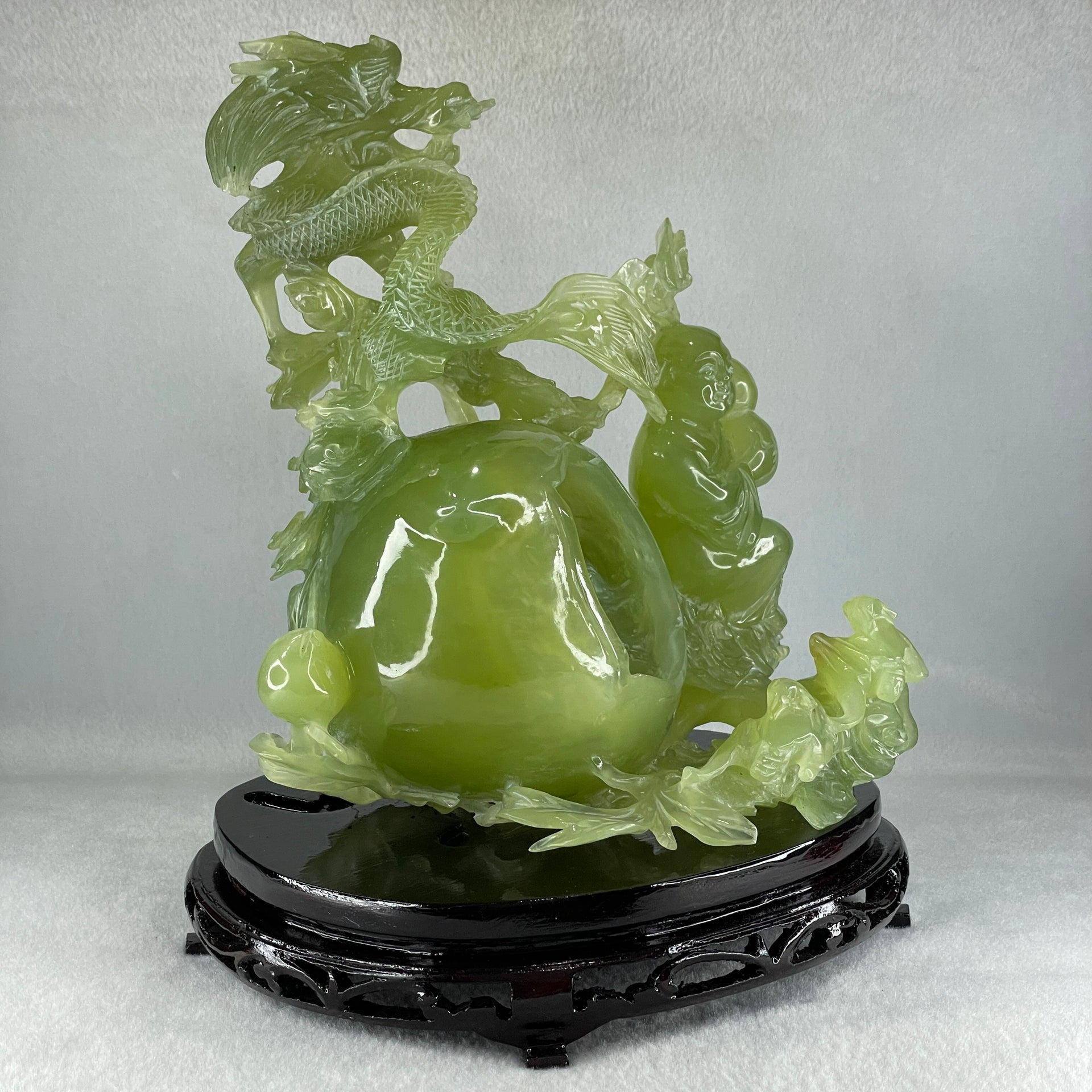 Natural Green Serpentine Dragon with Shou Xing Gong and Tong Zi with Wooden Stand Display 2610.6g 200.0 by 175.0 by 215.0mm - Huangs Jadeite and Jewelry Pte Ltd