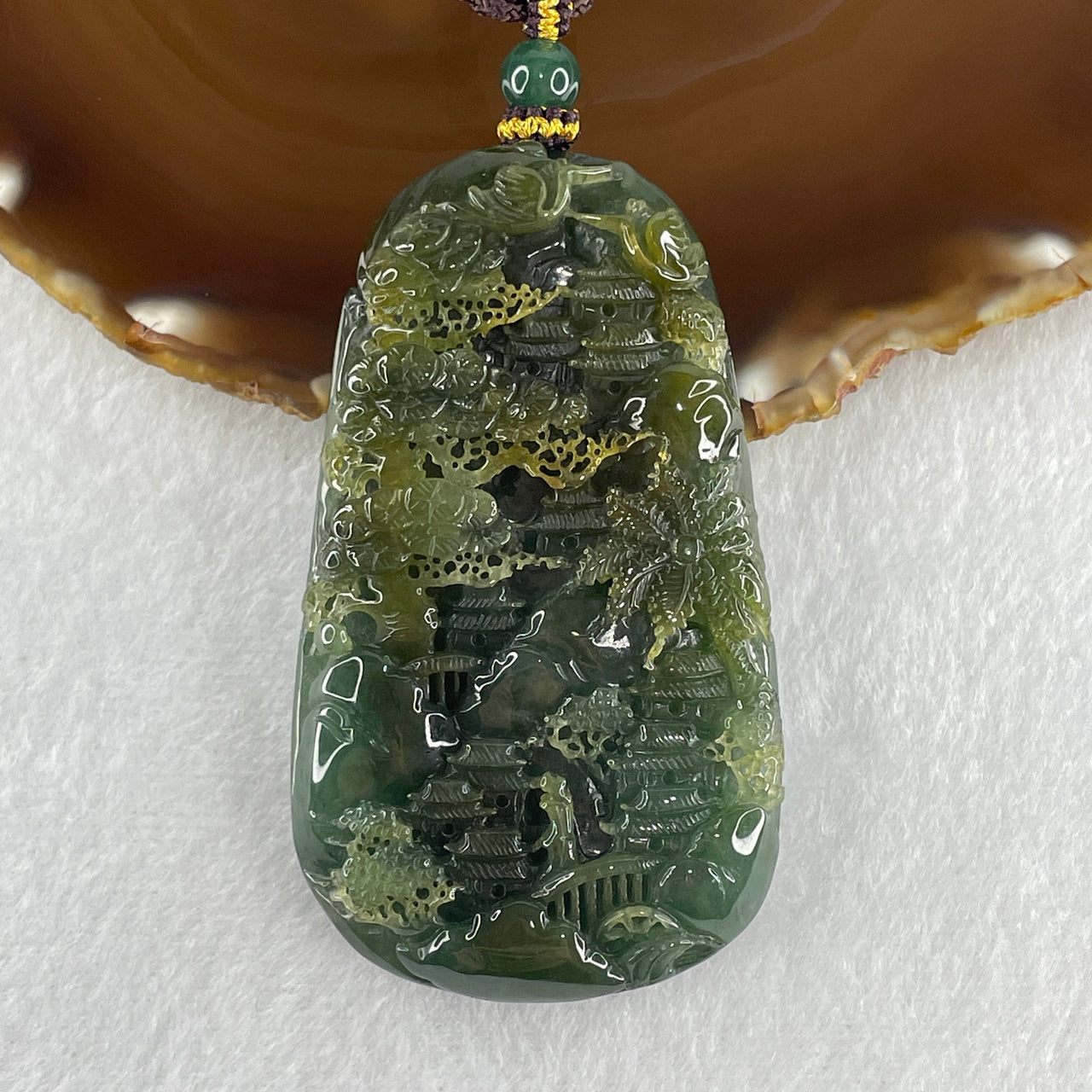 Grand Master Type Green with Brownish Yellow Jadeite Shan Shui with Gui Ren Pendant 112.63g 80.3 by 46.8 by 13.0mm