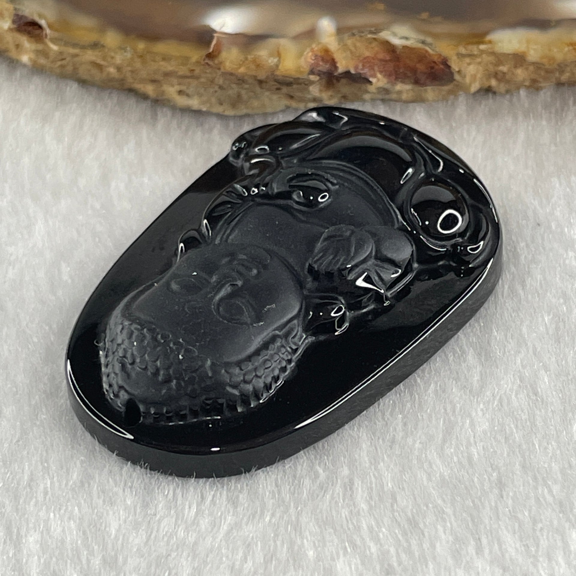 Type A Opaque to Partial Translucent Black Omphacite Jadeite Baby Buddha Pendant 13.75g 42.0 by 28.2 by 8.6mm - Huangs Jadeite and Jewelry Pte Ltd