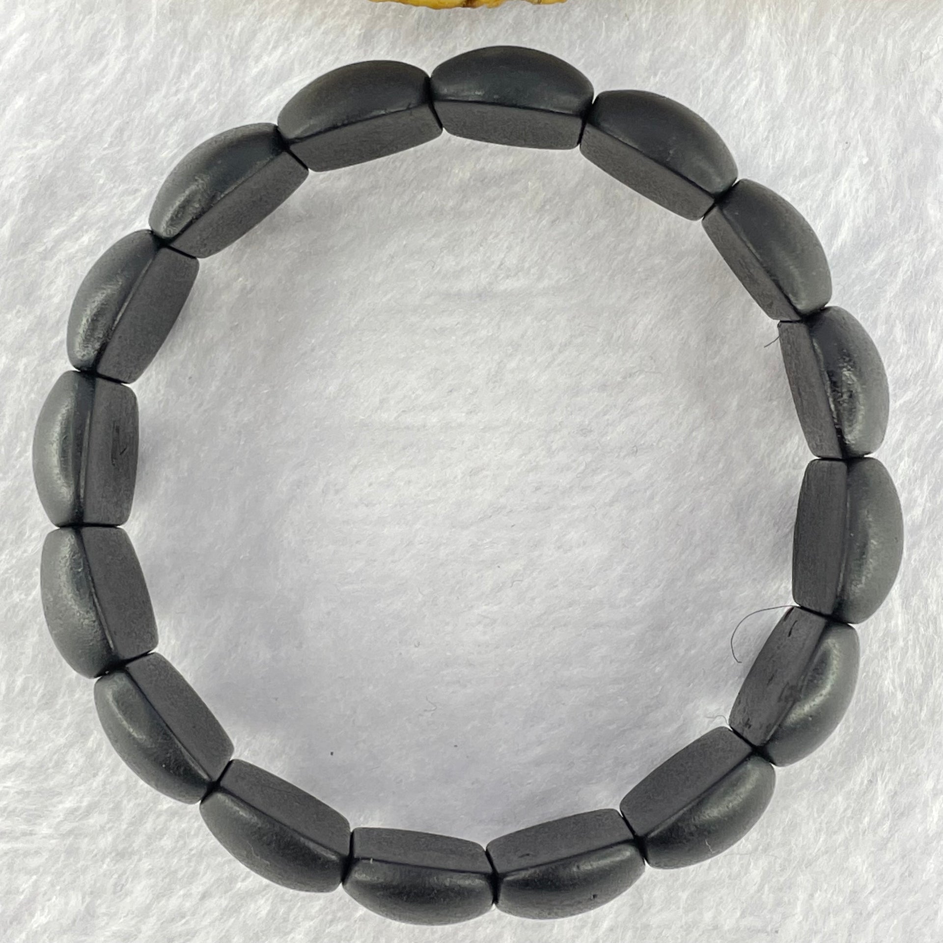Natural Dark Matt Black Amber Beads Bracelet 天然大黑天翁琥珀手链 22.84g 24.8 by 14.4 by 6.9mm 16pcs - Huangs Jadeite and Jewelry Pte Ltd