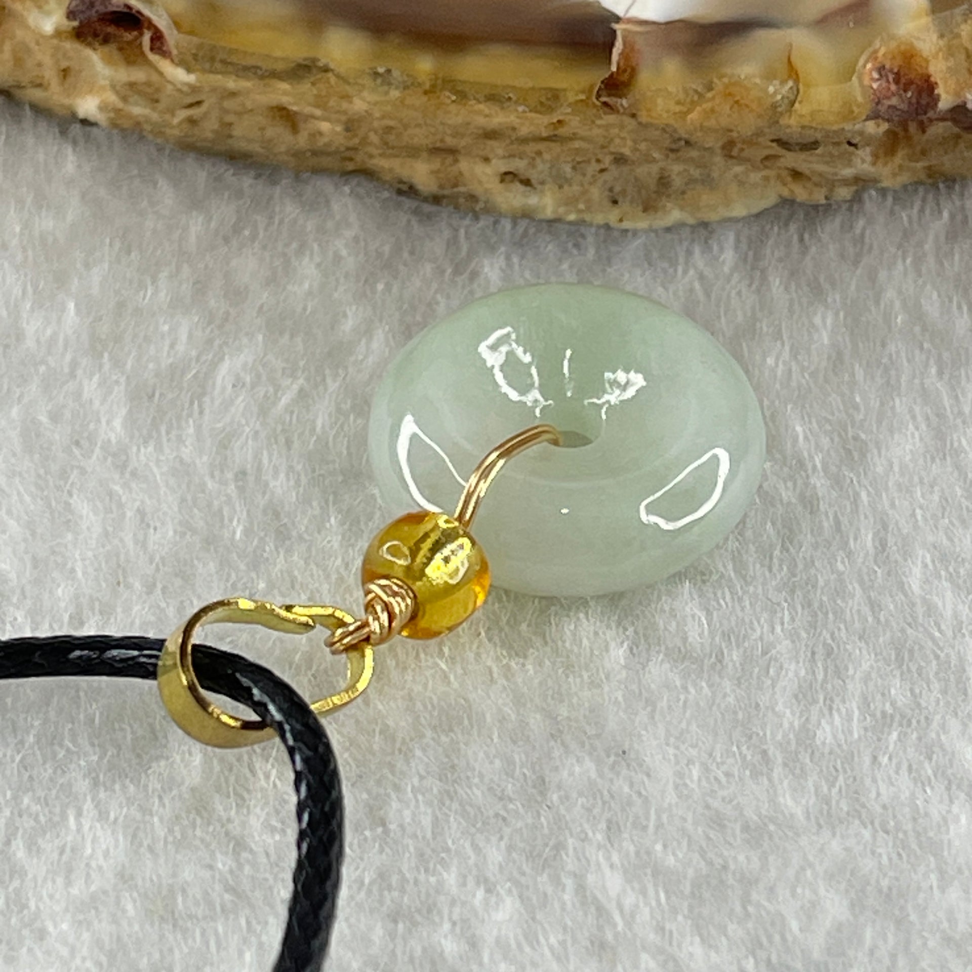 Type A Natural Faint Green Jadeite Ping An Kou Donut In String Necklace 2.68g 13.3 by 4.6mm - Huangs Jadeite and Jewelry Pte Ltd