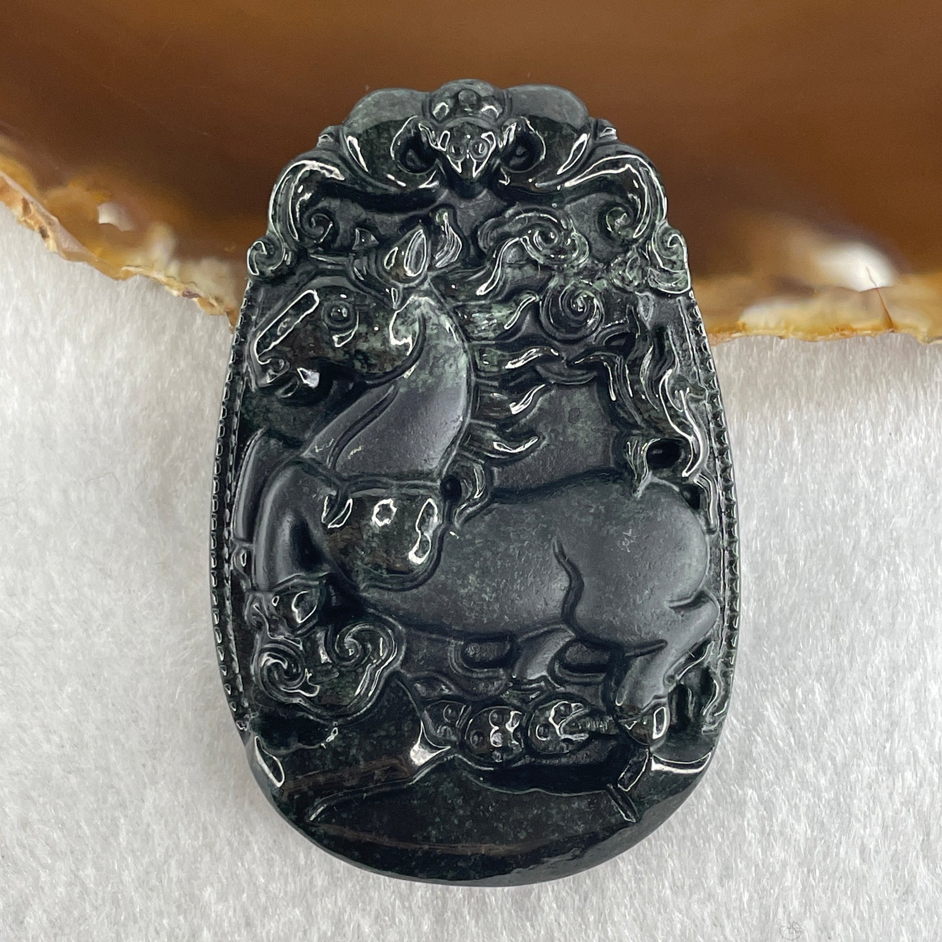 Type A Opaque to Partial Translucent Black Omphacite Jadeite Horse Pendant 26.34g 60.1 by 40.3 by 8.0mm - Huangs Jadeite and Jewelry Pte Ltd