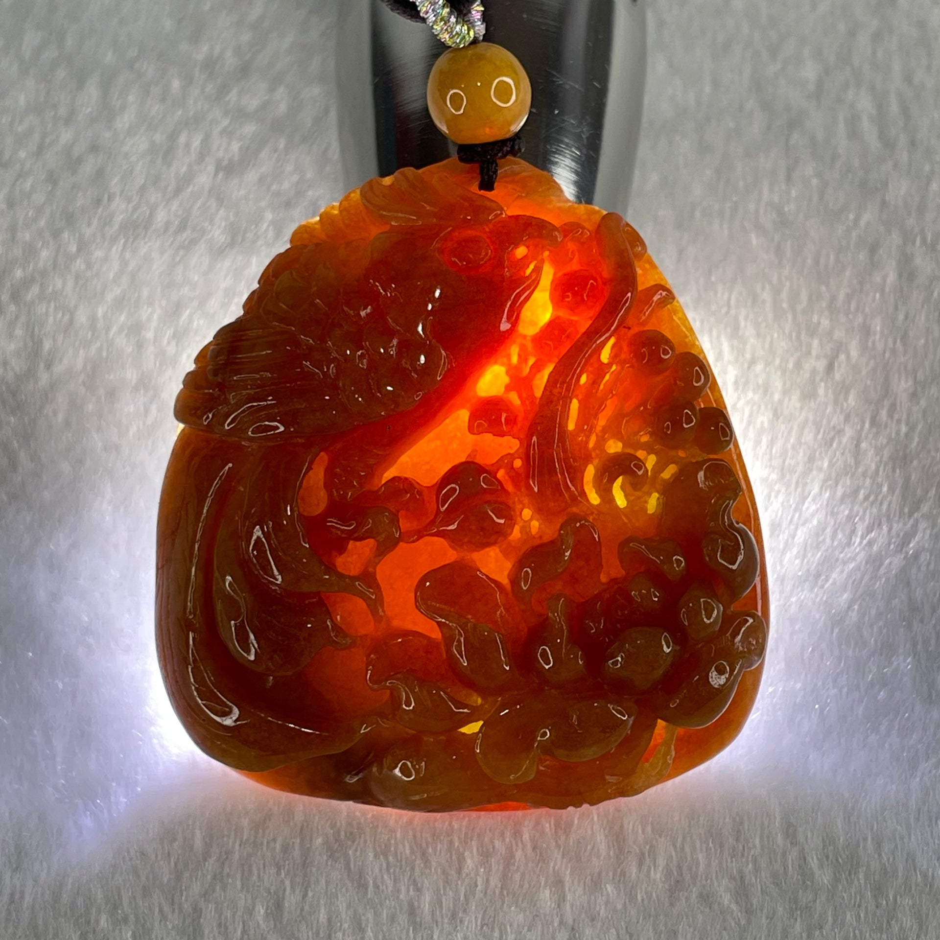 Grandmaster Type A Translucent Brownish Orange to Brownish Red with Light Blueish Green Jadeite Bird with Flower 花开富贵 Pendant 53.67g 49.27 by 46.37 by 12.66mm With NGI Cert 82838746 - Huangs Jadeite and Jewelry Pte Ltd