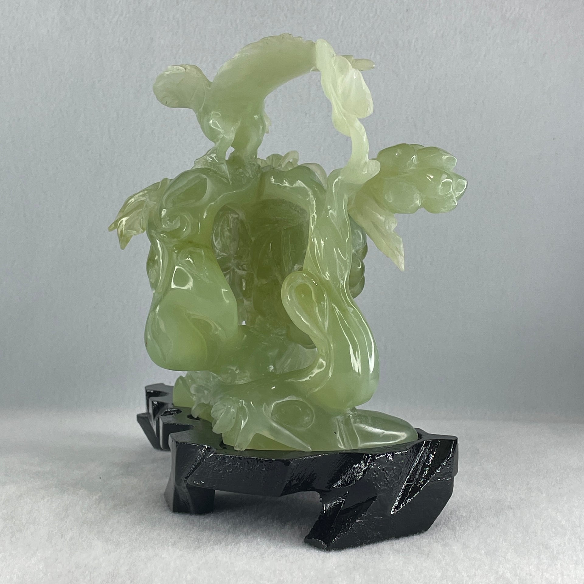 Natural Green Serpentine Magpie Bird with Cricket on Grape with Wooden Stand Display 1,042.7g L195.0 by B105.0 by H180.0 mm - Huangs Jadeite and Jewelry Pte Ltd