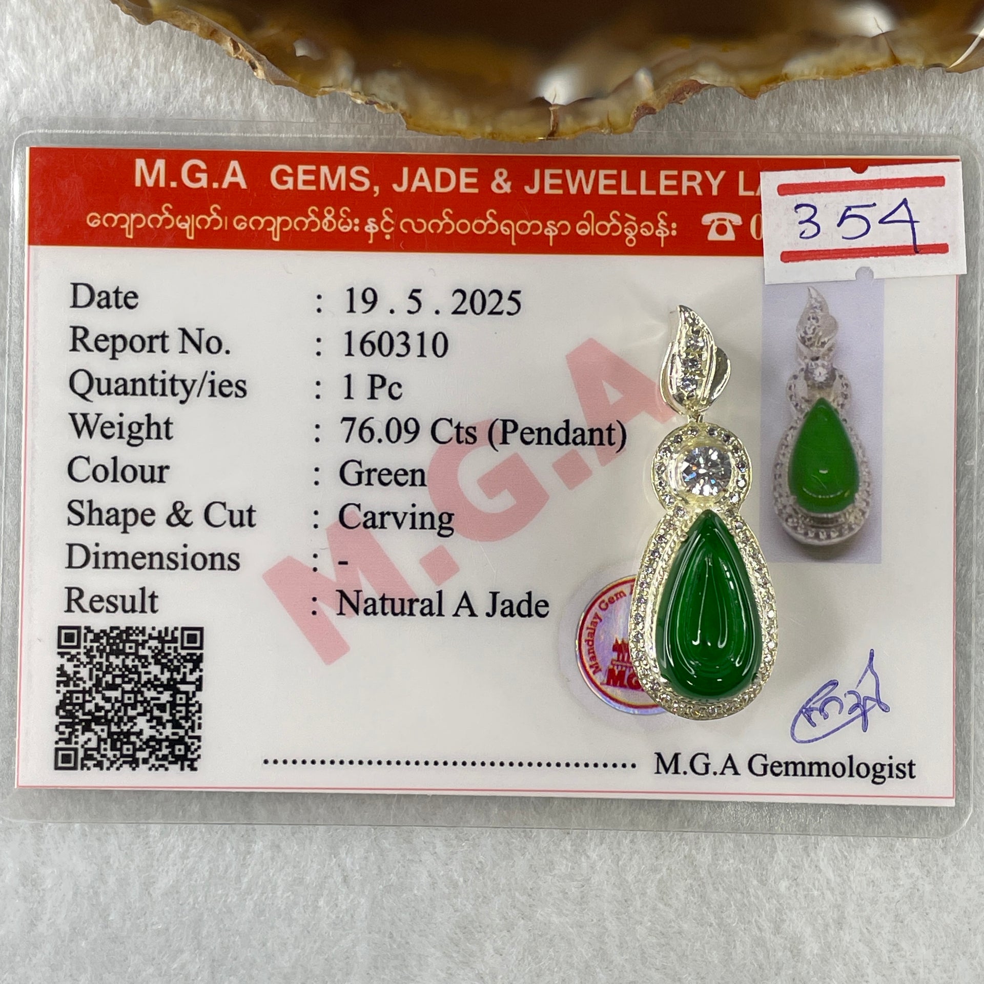 Type A Natural Semi Icy Bright Green Jadeite Tear Drop Shape Stone for Setting 18.1 by 10.5 by 3.0mm (On Silver Pendant Mold) 15.22g - Huangs Jadeite and Jewelry Pte Ltd