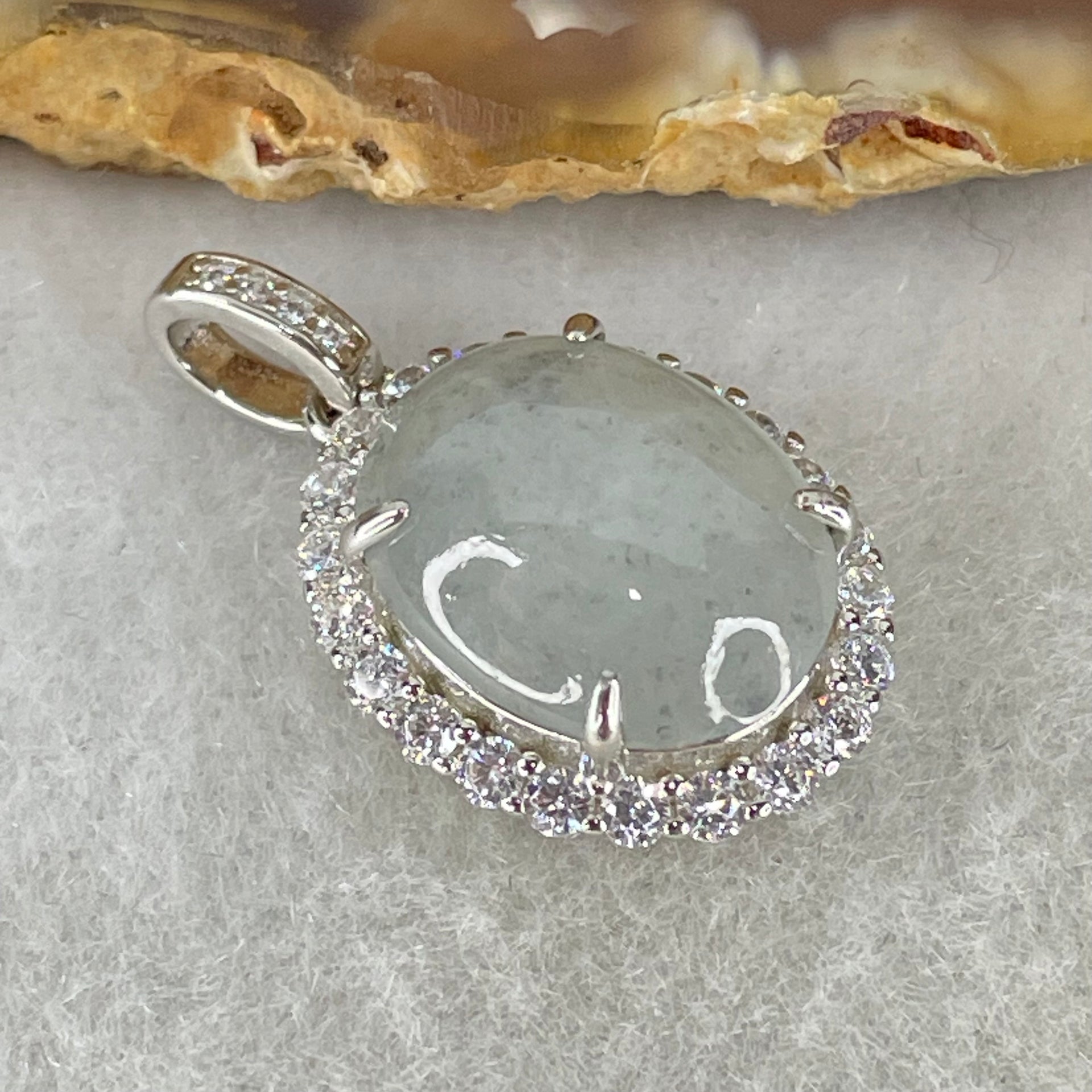 Type A Icy Green With Wuji Grey Spots Cabochon Jadeite in S925 Sliver Crystal Charm 2.85g 13.9 by 10.9 by 5.0mm - Huangs Jadeite and Jewelry Pte Ltd