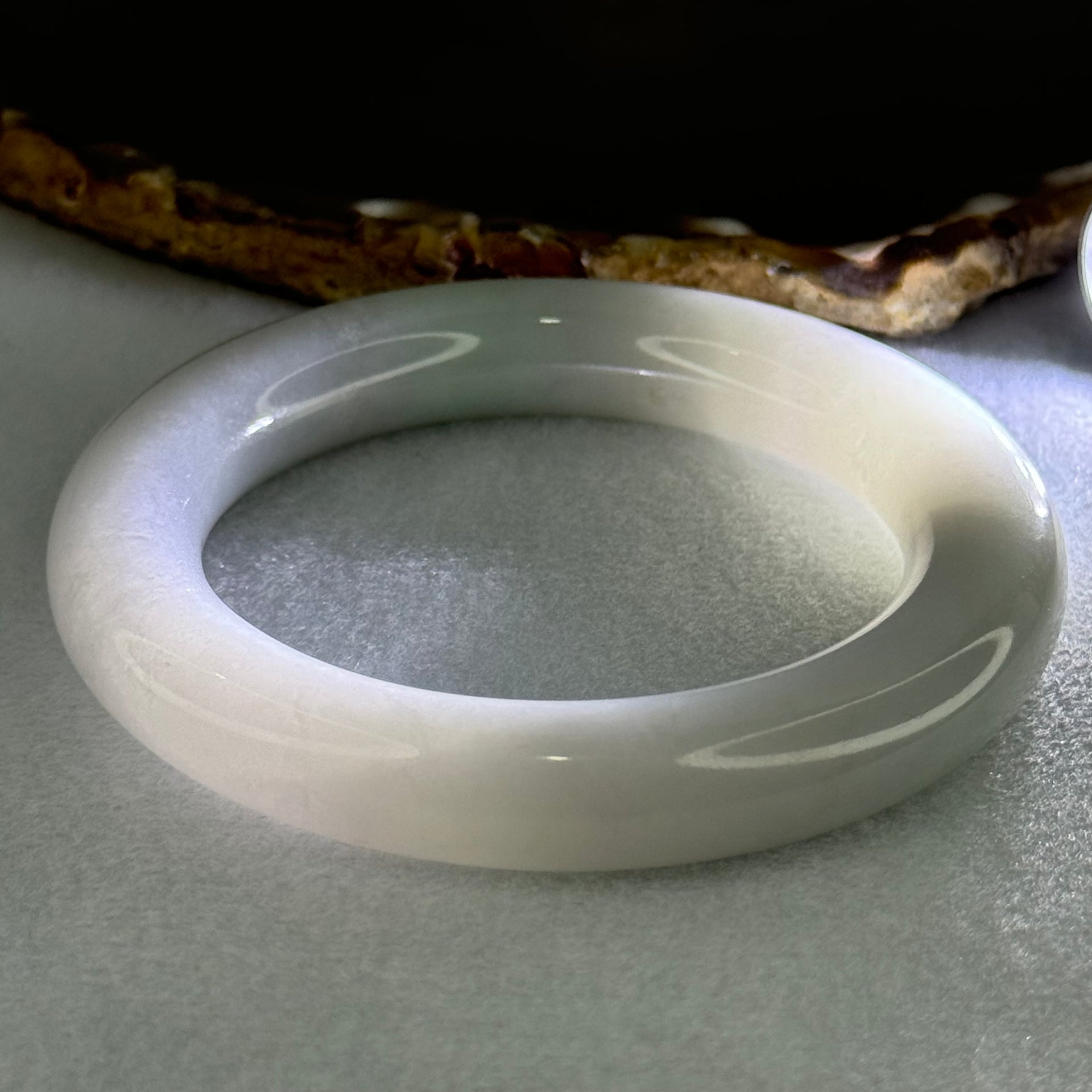 Type A Translucent Faint Blueish Green with Faint Lavender Jadeite Bangle Internal Diameter 56.79mm 437.29cts 87.85g 12.0 by 13.0mm With NGI Cert 32886087 (Close to Perfect) - Huangs Jadeite and Jewelry Pte Ltd