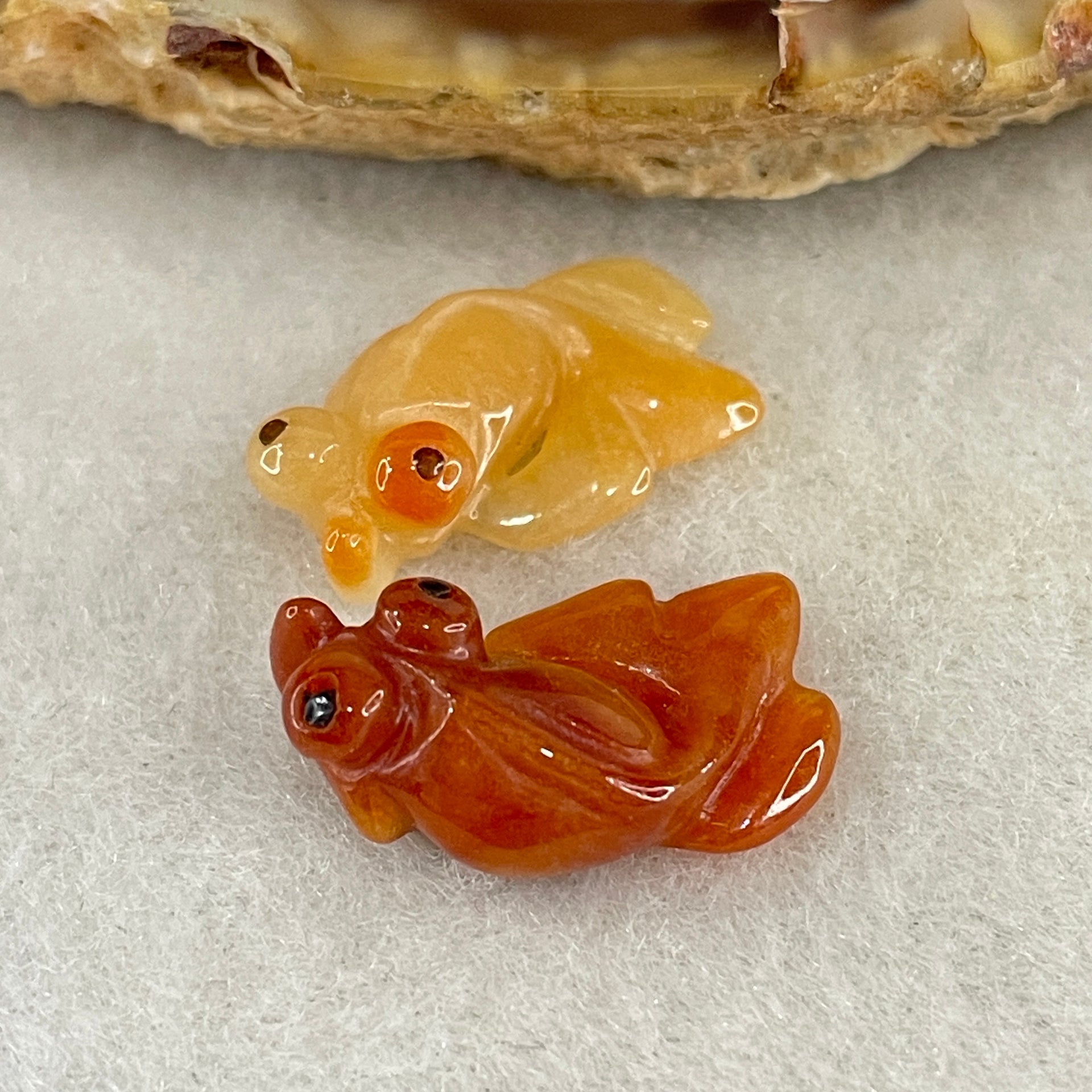 Natural Type A Yellow and Red Jadeite Pair Gold Fish Charm each 0.97g 16.9 by 9.4 by 5.5mm and 1.21g 17.0 by 9.8 by 5.7mm - Huangs Jadeite and Jewelry Pte Ltd