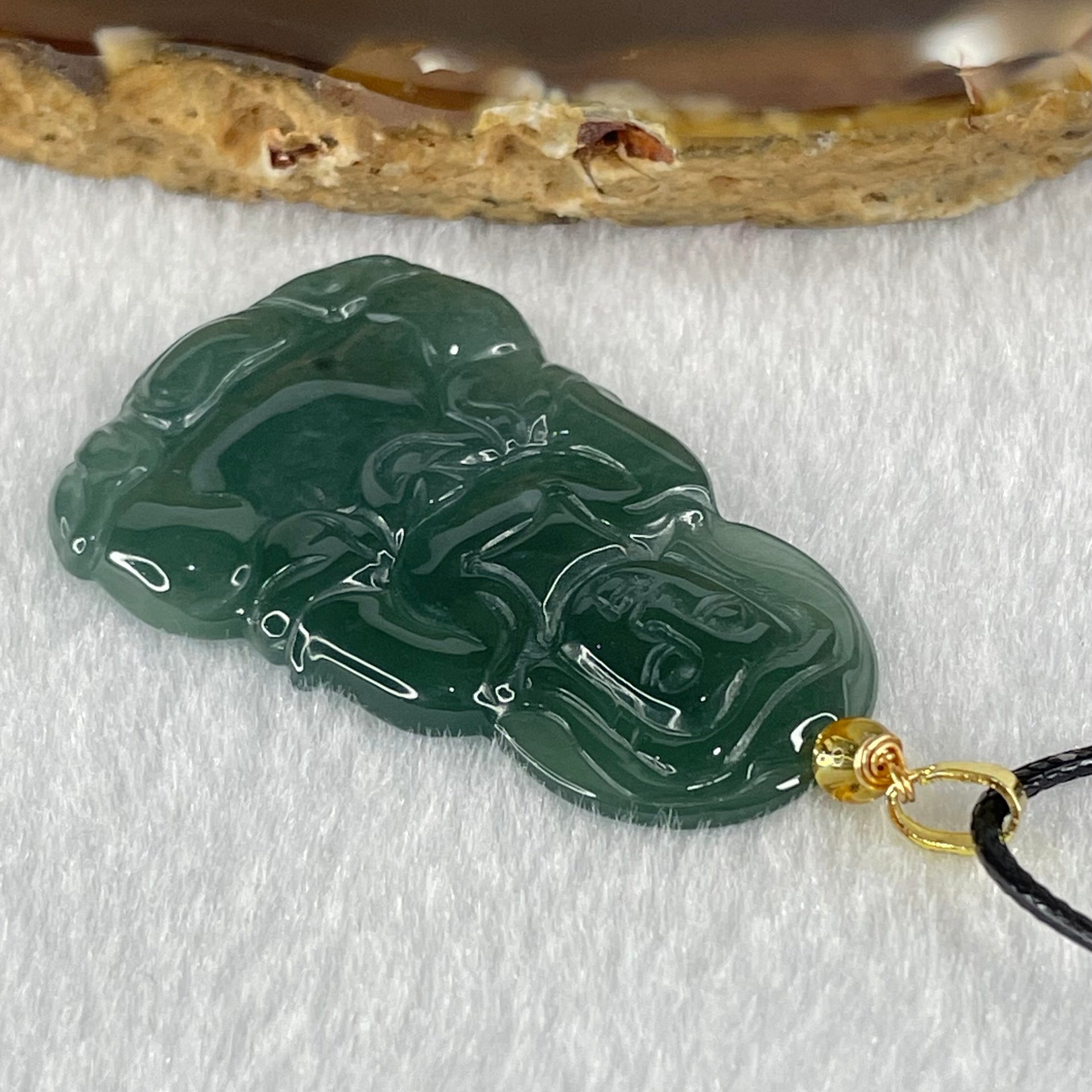 Type A Icy Blueish Green Jadeite Guan Yin Pendant Necklace 7.22g 40.9 by 26.8 by 4.0mm - Huangs Jadeite and Jewelry Pte Ltd