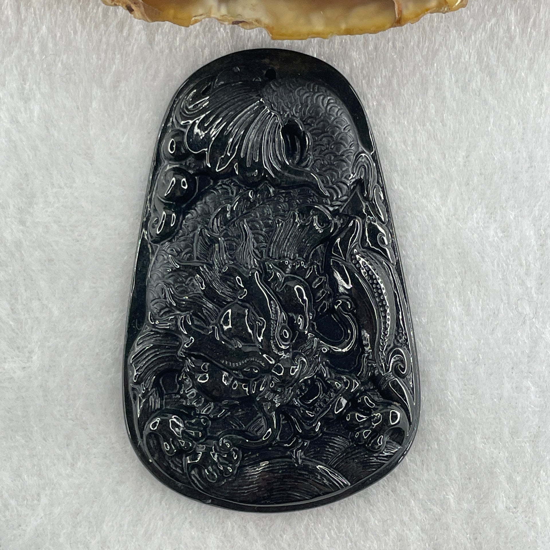 Type A Opaque to Partial Translucent Black Omphacite Jadeite Dragon Carp Pendant 20.39g 57.5 by 36.6 by 7.5mm - Huangs Jadeite and Jewelry Pte Ltd