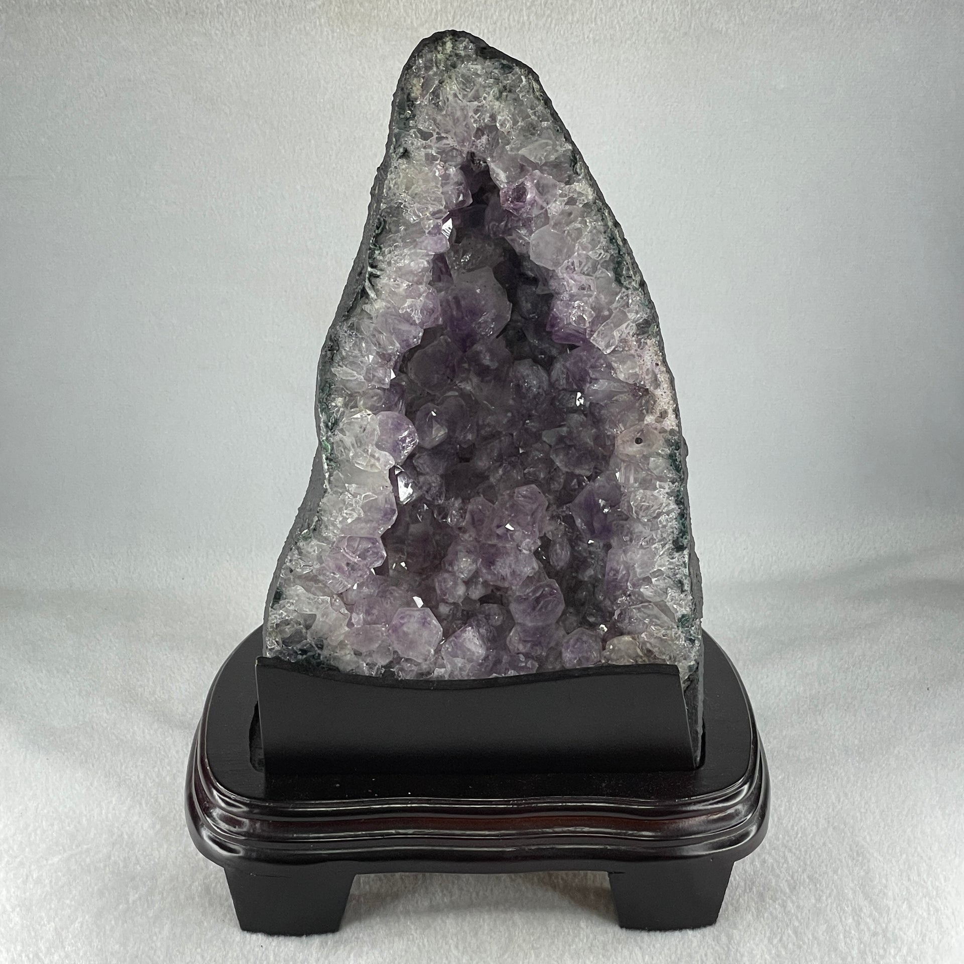 Natural Triangular Shape Amethyst Cave with Wooden Display 4,756.5g 200.0 by 170.0 by 295.0mm - Huangs Jadeite and Jewelry Pte Ltd