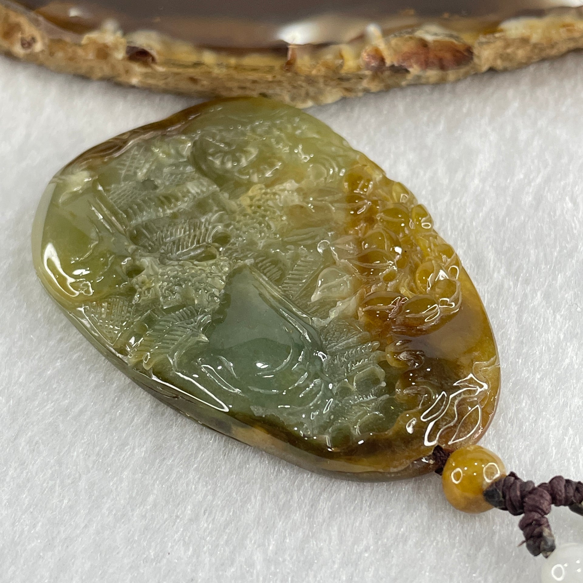 Grand Master Type A Green with Brownish Jadeite Shan Shui with Gui Ren Double Side Pendant 52.28g 55.3 by 38.2 by 7.3mm - Huangs Jadeite and Jewelry Pte Ltd
