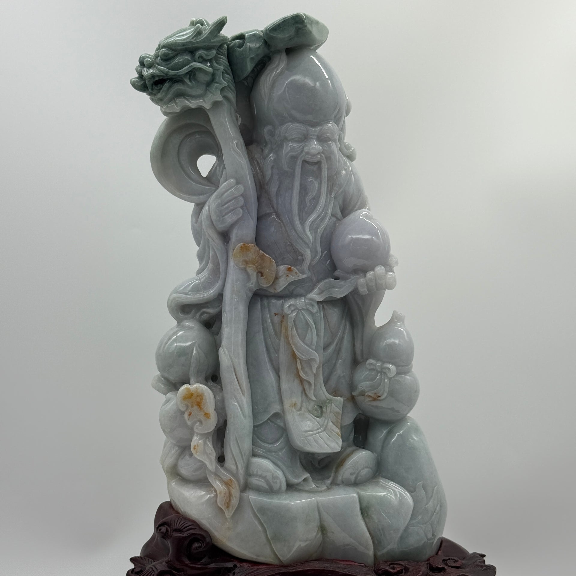 Type A Lavender, Green & Yellow Jade Jadeite Shou Xing Gong with Wooden Stand 财源滚滚 健康长寿 - 3.93kg Dimensions with Stand: 39 by 25 by 15cm Jade Dimensions: 27 by 15 by 7cm - Huangs Jadeite and Jewelry Pte Ltd