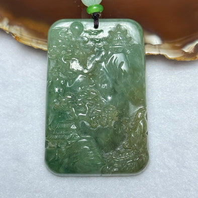 Type A Green with Brown Jadeite Shan Shui with Benefactor Pendent 45.74g 55.8 by 37.1 by 10.0mm - Huangs Jadeite and Jewelry Pte Ltd