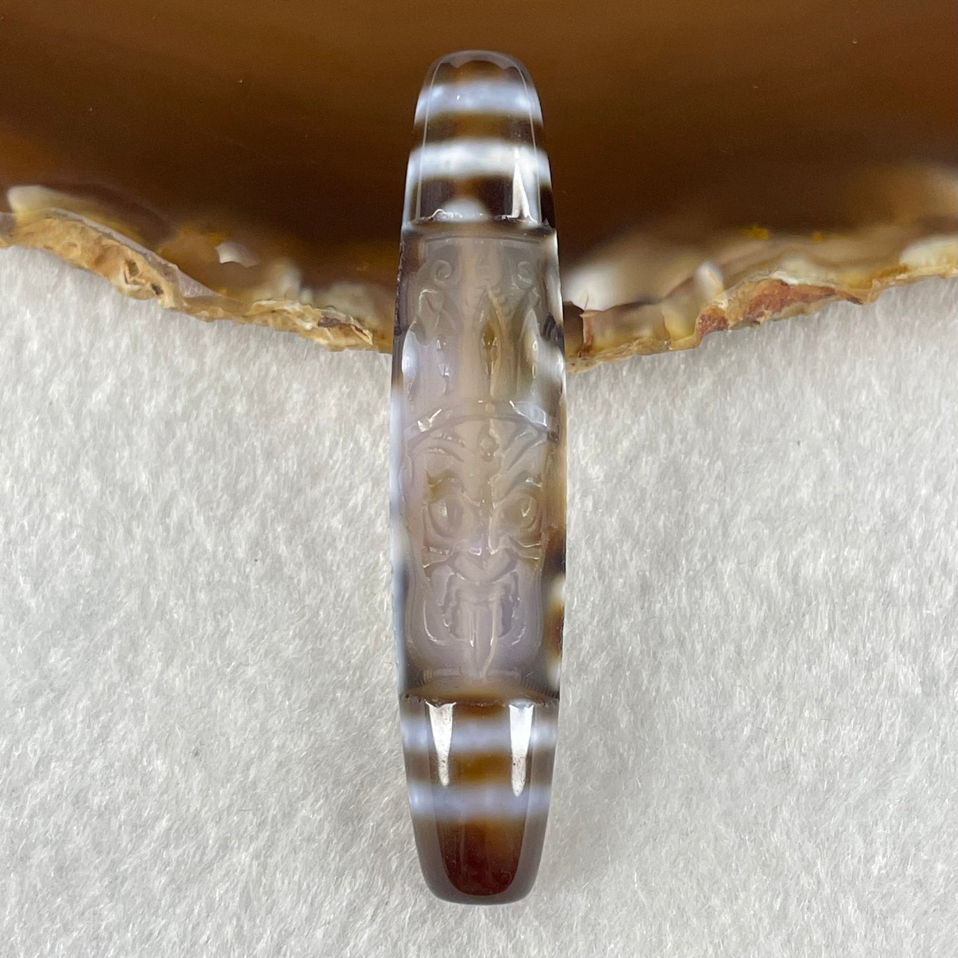 Natural Powerful Tibetan Old Oily Agate Zha Ji La Mu Female Cai Shen Carvings on 9 Eyes Dzi Bead Heavenly Master (Tian Zhu) 九眼扎基拉姆女财神天珠 11.04g 57.9 by 12.0mm - Huangs Jadeite and Jewelry Pte Ltd