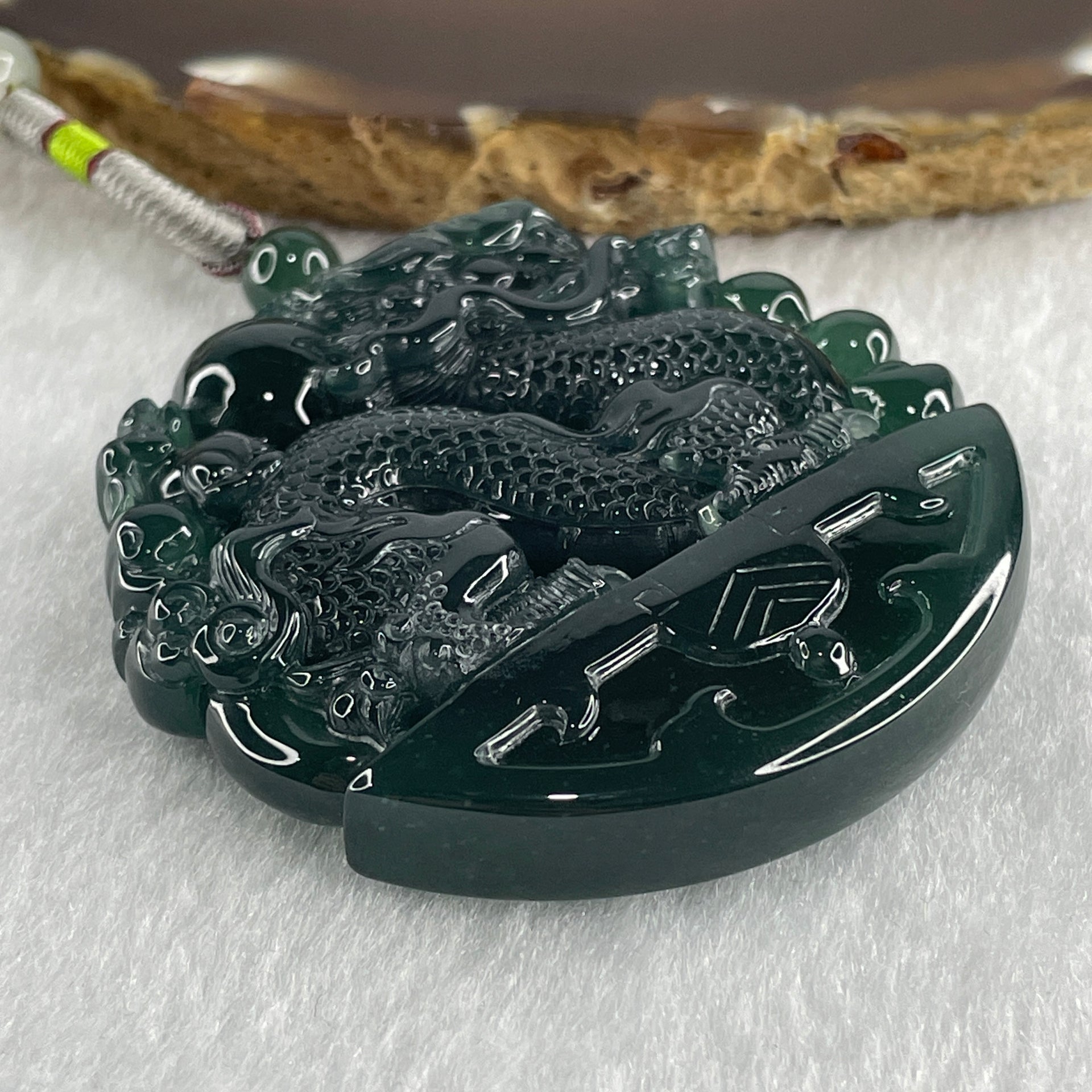 Type A Semi Icy Blueish Green Jadeite Double Dragon Pendant 71.30g 54.0 by 11.9mm - Huangs Jadeite and Jewelry Pte Ltd